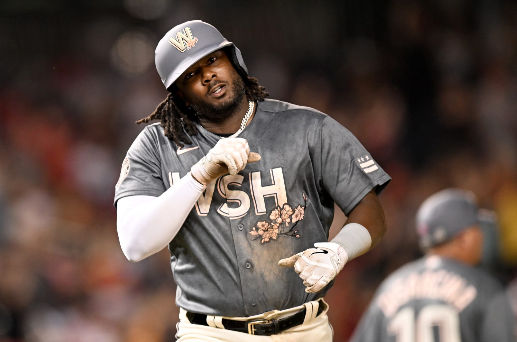 WASHINGTON, DC - JULY 30: Josh Bell #19 of the Washington Nationals celebrates after hitting a three-run home run in the seventh inning against the St. Louis Cardinals at Nationals Park on July 30, 2022 in Washington, DC. (Photo by Greg Fiume/Getty Images)