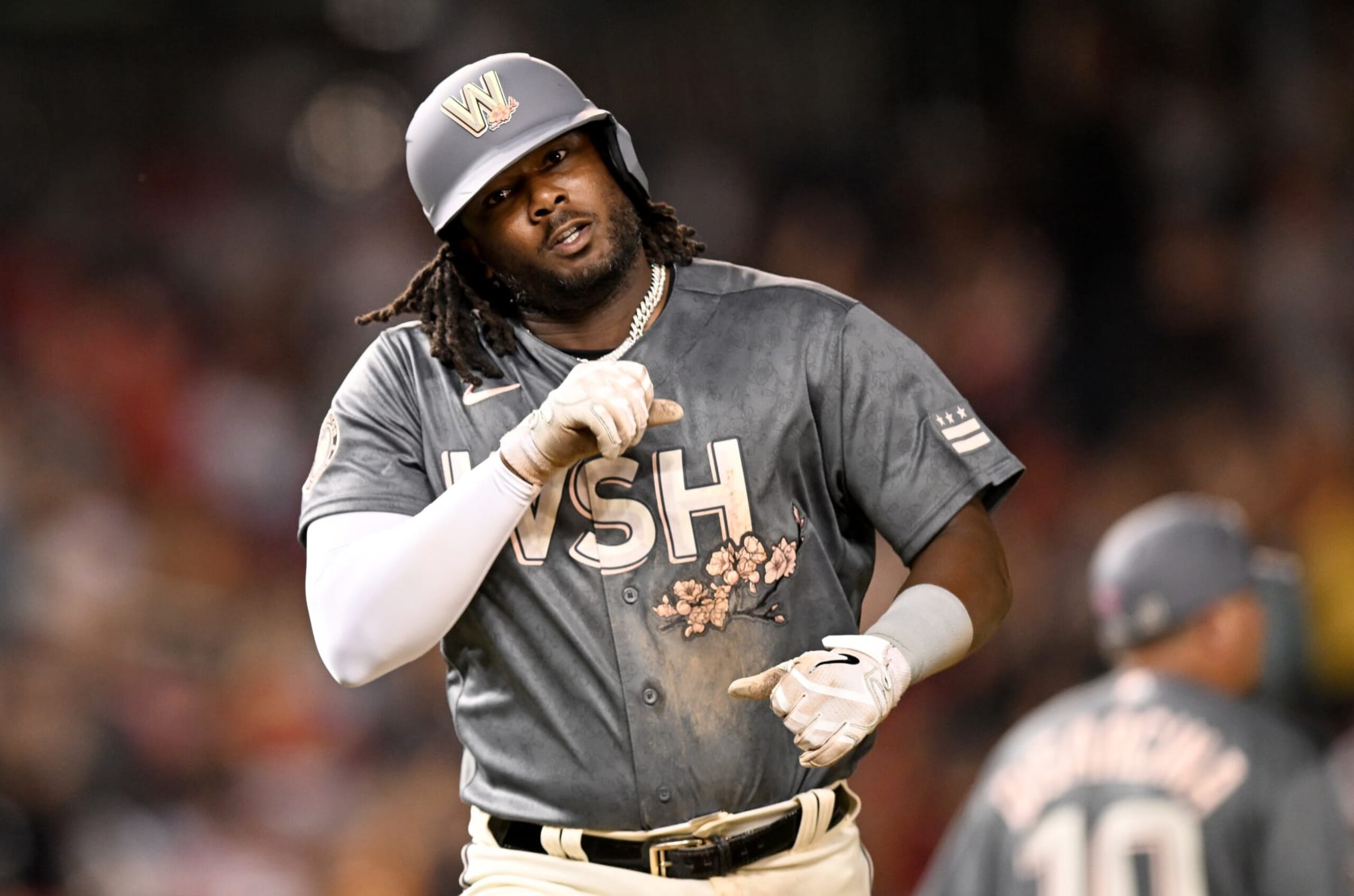 WASHINGTON, DC - JULY 30: Josh Bell #19 of the Washington Nationals celebrates after hitting a three-run home run in the seventh inning against the St. Louis Cardinals at Nationals Park on July 30, 2022 in Washington, DC. (Photo by Greg Fiume/Getty Images)