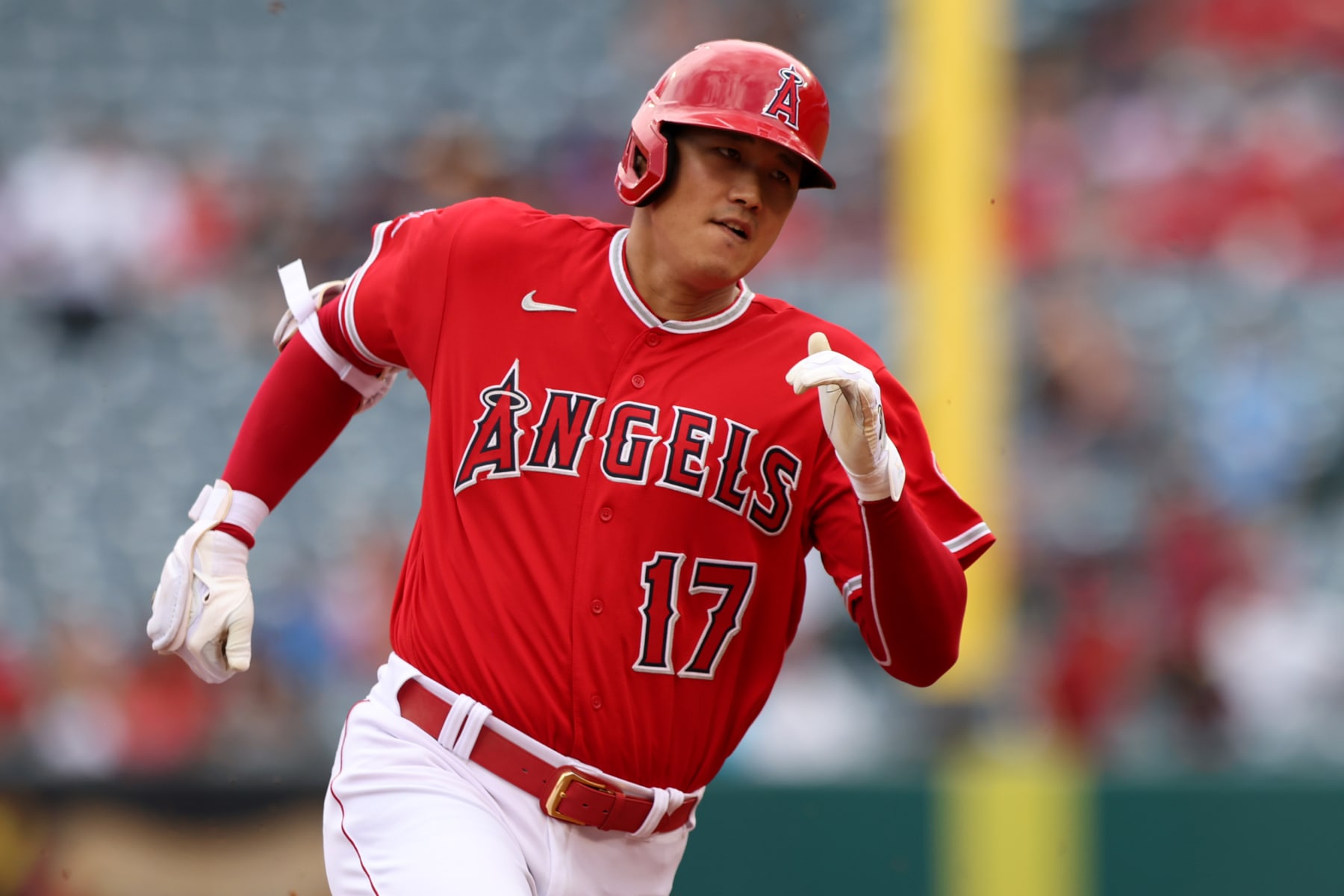 ANAHEIM, CALIFORNIA - JULY 31: Shohei Ohtani #17 of the Los Angeles Angels runs for third base after hitting a triple in the third inning against the Texas Rangers at Angel Stadium of Anaheim on July 31, 2022 in Anaheim, California. (Photo by Katharine Lotze/Getty Images)