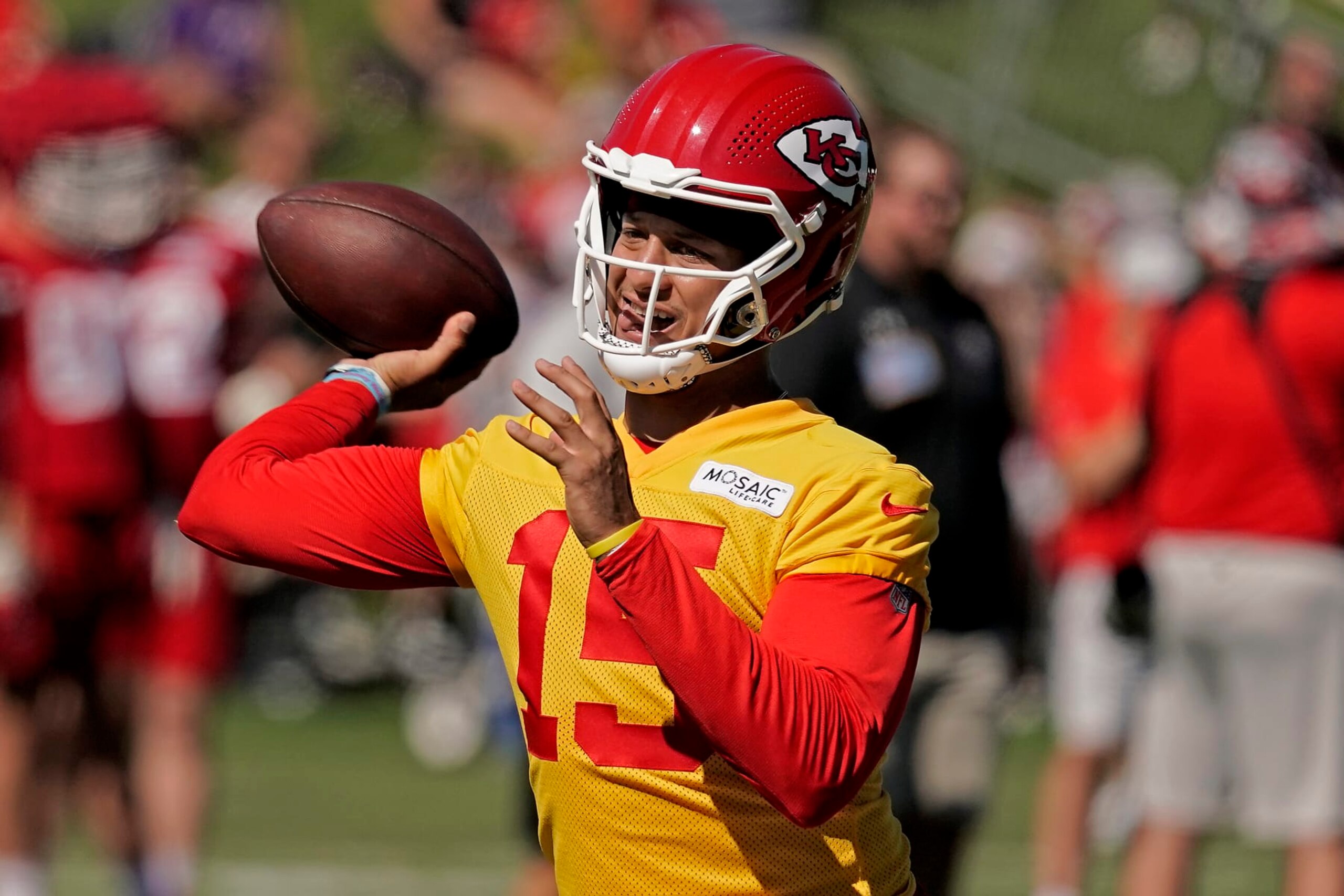 Kansas City Chiefs quarterback Patrick Mahomes throws during NFL football training camp Saturday, July 30, 2022, in St. Joseph, Mo. (AP Photo/Charlie Riedel) Kansas City Chiefs quarterback Patrick Mahomes throws during NFL football training camp Saturday, July 30, 2022, in St. Joseph, Mo. (AP Photo/Charlie Riedel)