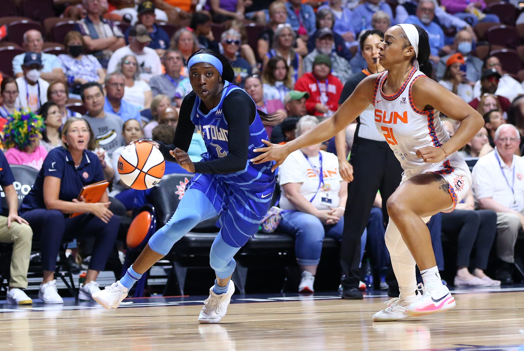 UNCASVILLE, CT - JULY 31: Chicago Sky guard Kahleah Copper (2) drives past Connecticut Sun guard DiJonai Carrington (21) during a WNBA game between Chicago Sky and Connecticut Sun on July 31, 2022, at Mohegan Sun Arena in Uncasville, CT. (Photo by M. Anthony Nesmith/Icon Sportswire via Getty Images)