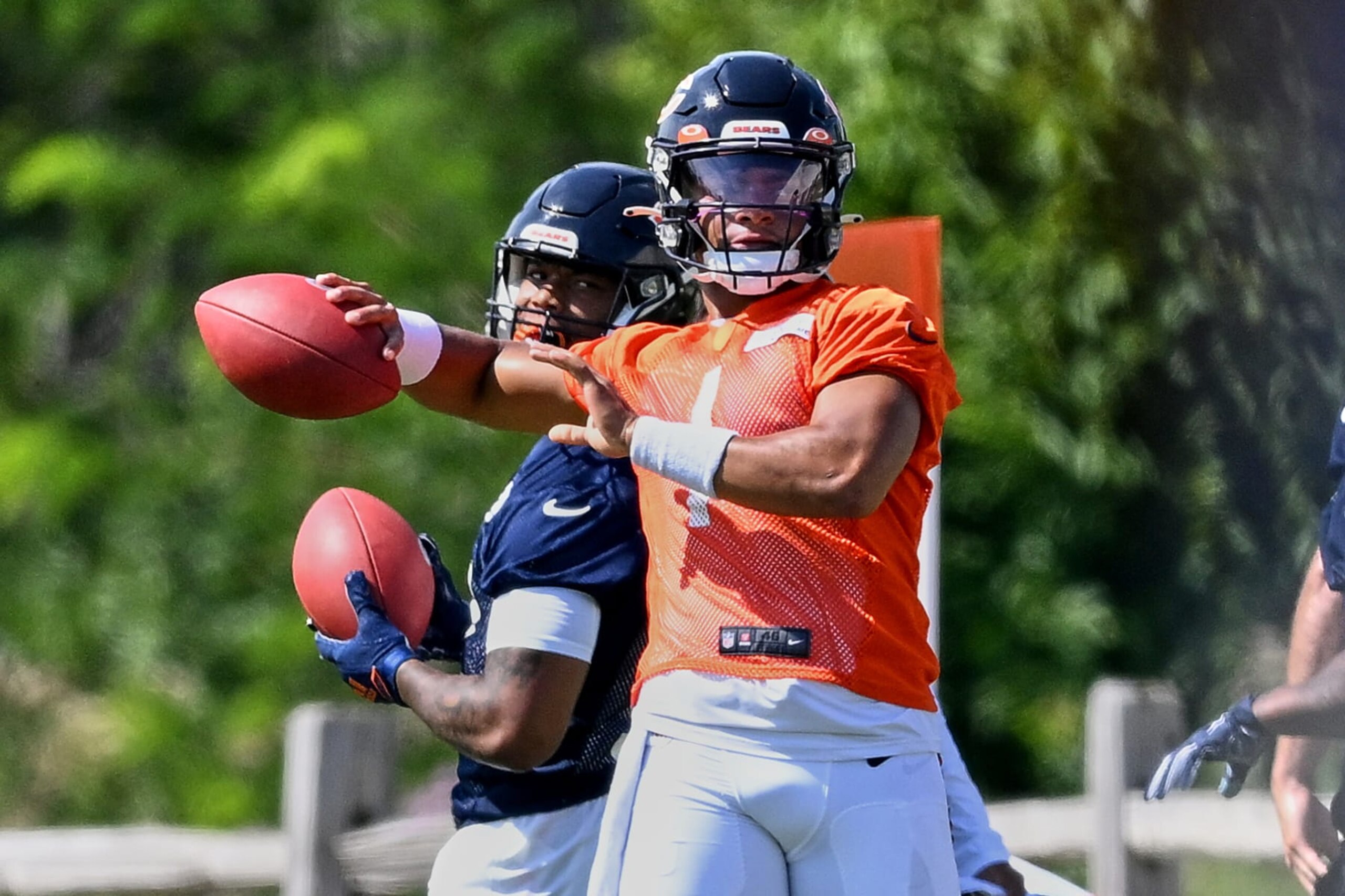LAKE FOREST, IL - JULY 27: Chicago Bears quarterback Justin Fields (1) throws the football during the the Chicago Bears Training Camp on July 27, 2022 at Halas Hall in Lake Forest, IL. (Photo by Robin Alam/Icon Sportswire via Getty Images) LAKE FOREST, IL - JULY 27: Chicago Bears quarterback Justin Fields (1) throws the football during the the Chicago Bears Training Camp on July 27, 2022 at Halas Hall in Lake Forest, IL. (Photo by Robin Alam/Icon Sportswire via Getty Images)