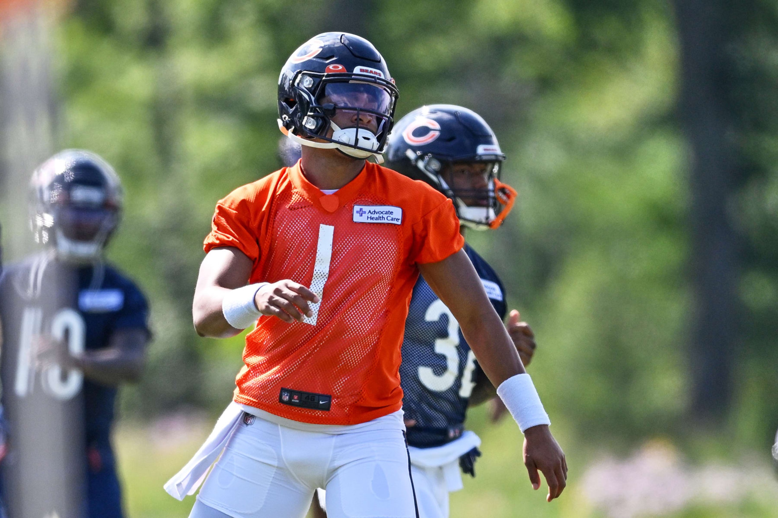 LAKE FOREST, IL - JULY 27: Chicago Bears quarterback Justin Fields (1) warms up during the Chicago Bears Training Camp on July 27, 2022 at Halas Hall in Lake Forest, IL. (Photo by Robin Alam/Icon Sportswire via Getty Images) LAKE FOREST, IL - JULY 27: Chicago Bears quarterback Justin Fields (1) warms up during the Chicago Bears Training Camp on July 27, 2022 at Halas Hall in Lake Forest, IL. (Photo by Robin Alam/Icon Sportswire via Getty Images)