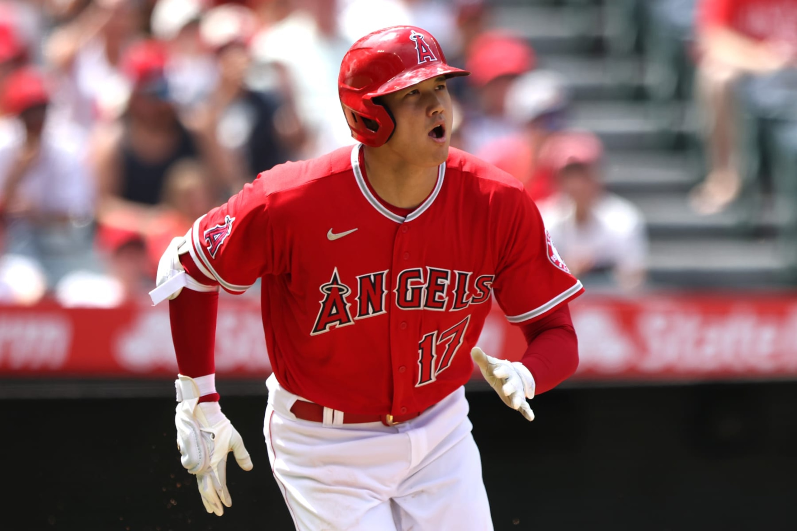 ANAHEIM, CALIFORNIA - JULY 31: Shohei Ohtani #17 of the Los Angeles Angels runs to first after a hitting a single in the fifth inning against the Texas Rangers at Angel Stadium of Anaheim on July 31, 2022 in Anaheim, California. (Photo by Katharine Lotze/Getty Images) ANAHEIM, CALIFORNIA - JULY 31: Shohei Ohtani #17 of the Los Angeles Angels runs to first after a hitting a single in the fifth inning against the Texas Rangers at Angel Stadium of Anaheim on July 31, 2022 in Anaheim, California. (Photo by Katharine Lotze/Getty Images)
