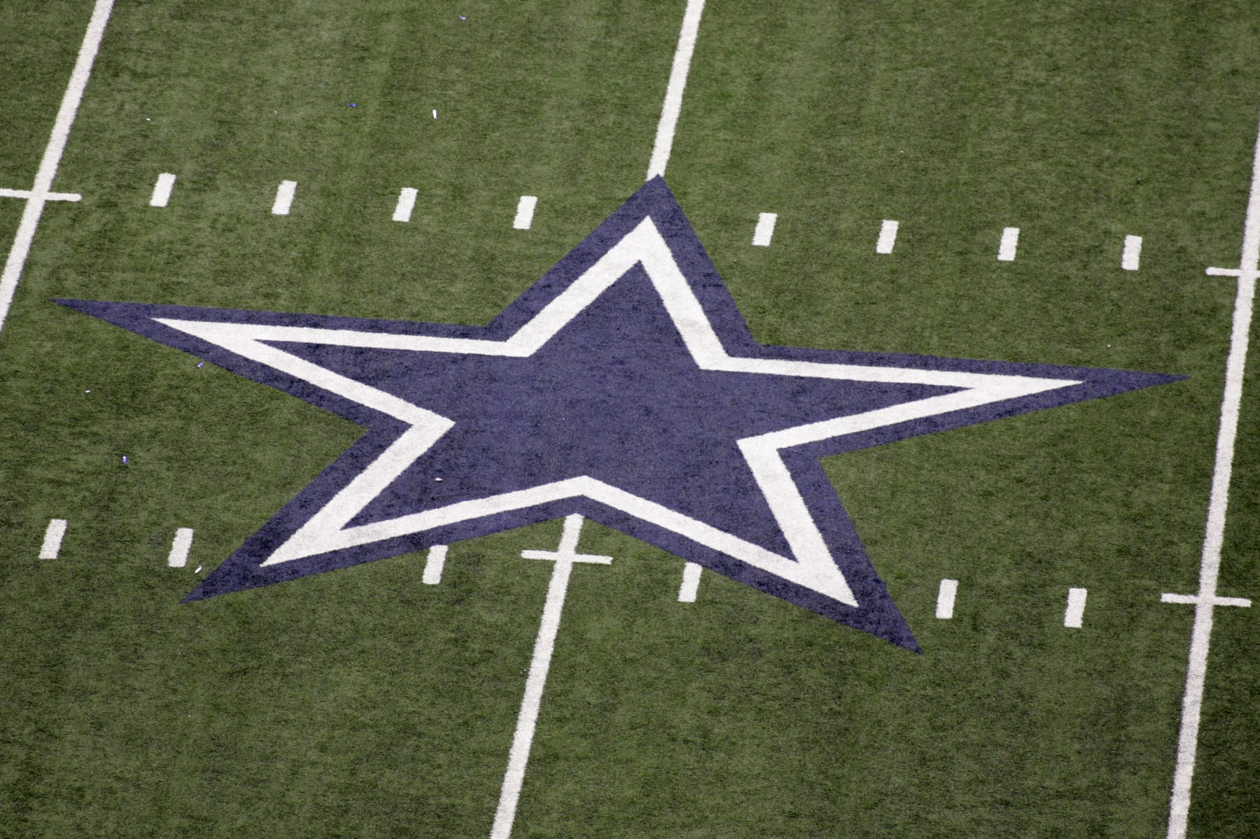 The Dallas Cowboys star at midfield during an NFL football game against the San Diego Chargers, Sunday, Dec. 13, 2009, in Arlington, Texas. (AP Photo/Sharon Ellman)