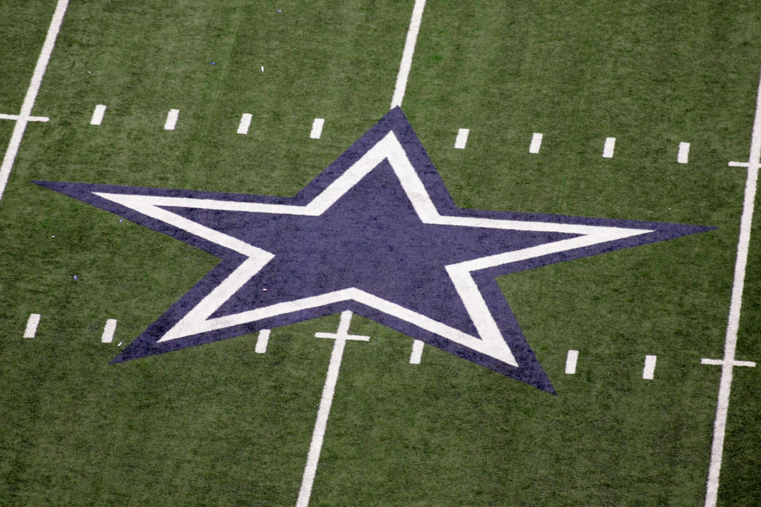 The Dallas Cowboys star at midfield during an NFL football game against the San Diego Chargers, Sunday, Dec. 13, 2009, in Arlington, Texas. (AP Photo/Sharon Ellman)