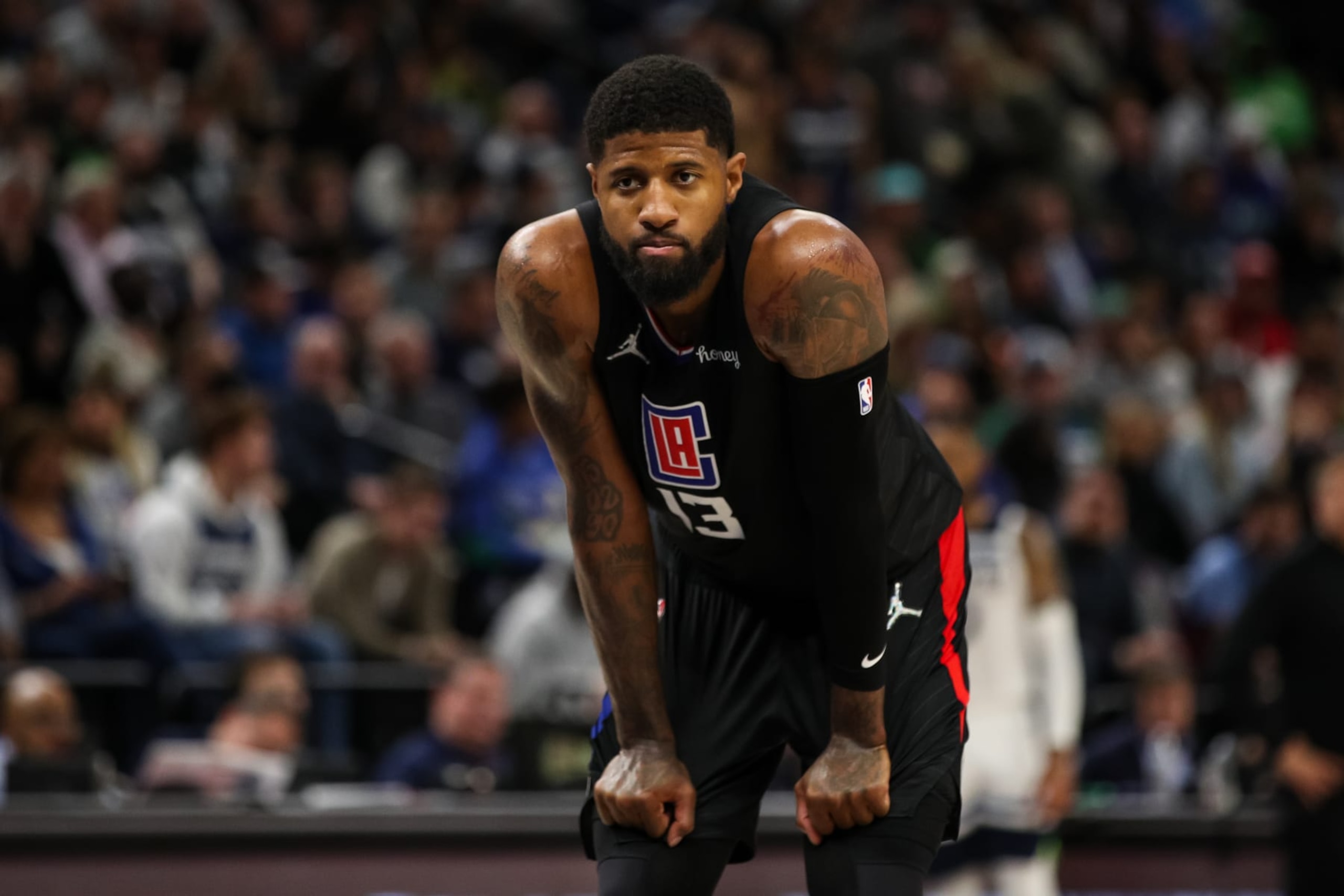 MINNEAPOLIS, MN - APRIL 12: Paul George #13 of the Los Angeles Clippers looks on before shooting free throws against the Minnesota Timberwolves in the third quarter during a Play-In Tournament game at Target Center on April 12, 2022 in Minneapolis, Minnesota. The Timberwolves won 109-104 to advance to the NBA Playoffs. NOTE TO USER: User expressly acknowledges and agrees that, by downloading and or using this Photograph, user is consenting to the terms and conditions of the Getty Images License Agreement. (Photo by David Berding/Getty Images) MINNEAPOLIS, MN - APRIL 12: Paul George #13 of the Los Angeles Clippers looks on before shooting free throws against the Minnesota Timberwolves in the third quarter during a Play-In Tournament game at Target Center on April 12, 2022 in Minneapolis, Minnesota. The Timberwolves won 109-104 to advance to the NBA Playoffs. NOTE TO USER: User expressly acknowledges and agrees that, by downloading and or using this Photograph, user is consenting to the terms and conditions of the Getty Images License Agreement. (Photo by David Berding/Getty Images)