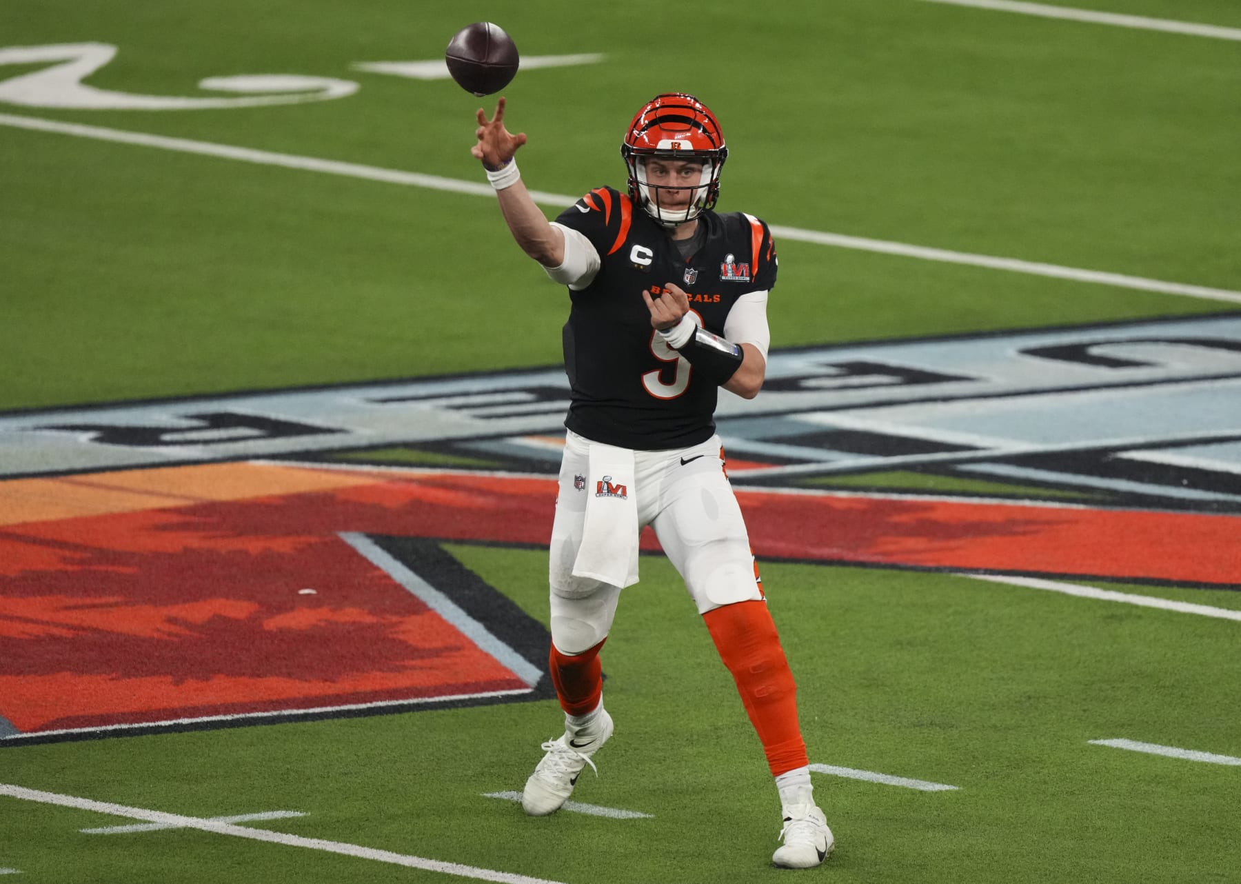 INGLEWOOD, CALIFORNIA - FEBRUARY 13: Joe Burrow #9 of the Cincinnati Bengals throws the ball during to the NFL Super Bowl LVI football game against the Los Angeles Rams at SoFi Stadium on February 13, 2022 in Inglewood, California. (Photo by Cooper Neill/Getty Images)