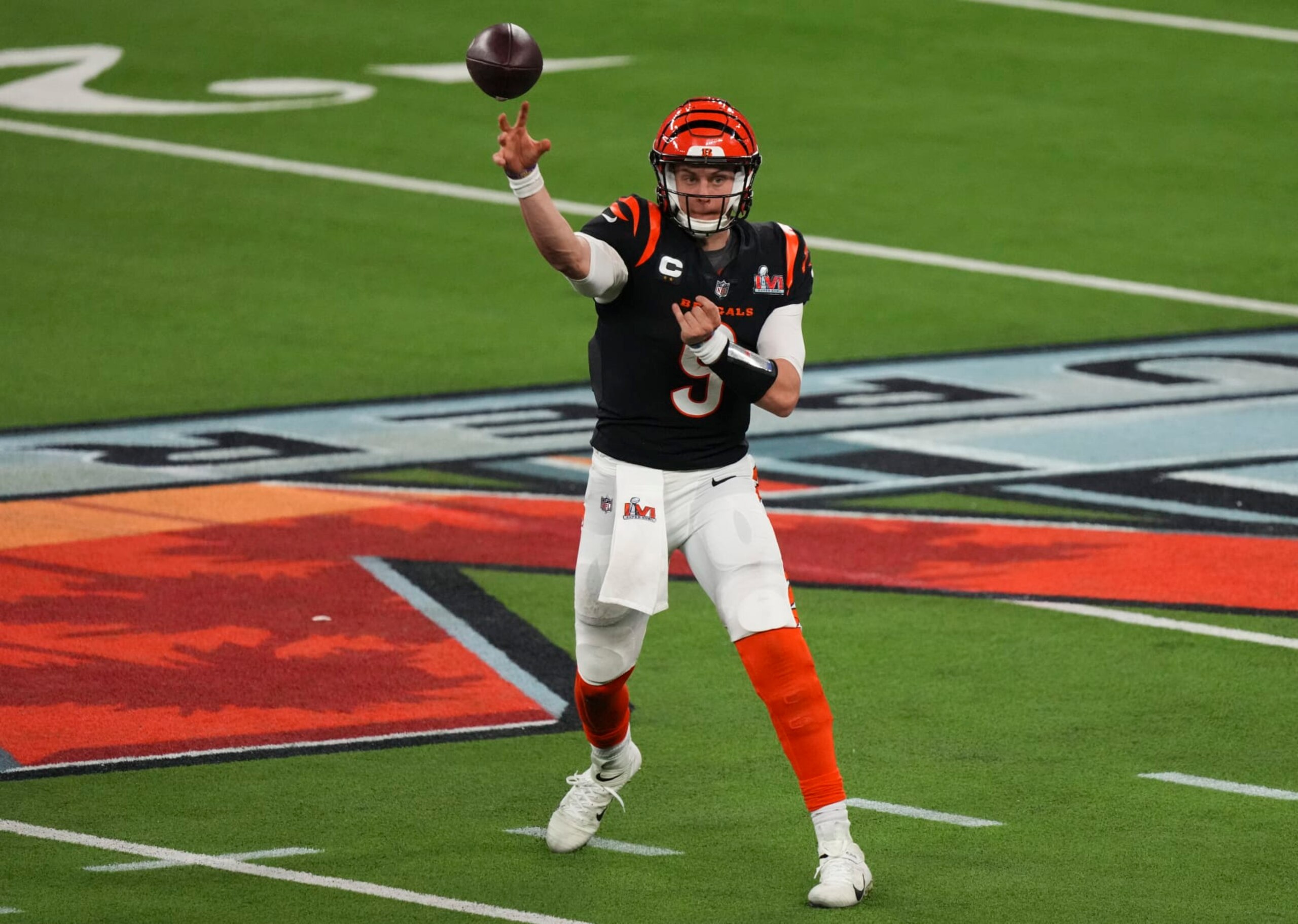 INGLEWOOD, CALIFORNIA - FEBRUARY 13: Joe Burrow #9 of the Cincinnati Bengals throws the ball during to the NFL Super Bowl LVI football game against the Los Angeles Rams at SoFi Stadium on February 13, 2022 in Inglewood, California. (Photo by Cooper Neill/Getty Images)