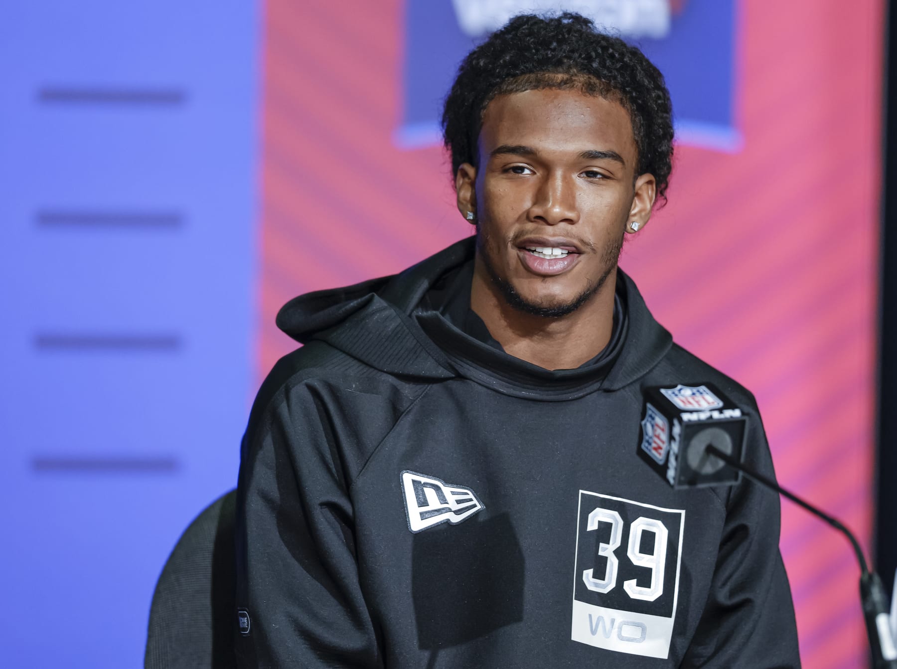INDIANAPOLIS, IN - MAR 02: Garrett Wilson #WO39 of the Ohio State Buckeyes speaks to reporters during the NFL Draft Combine at the Indiana Convention Center on March 2, 2022 in Indianapolis, Indiana. (Photo by Michael Hickey/Getty Images)