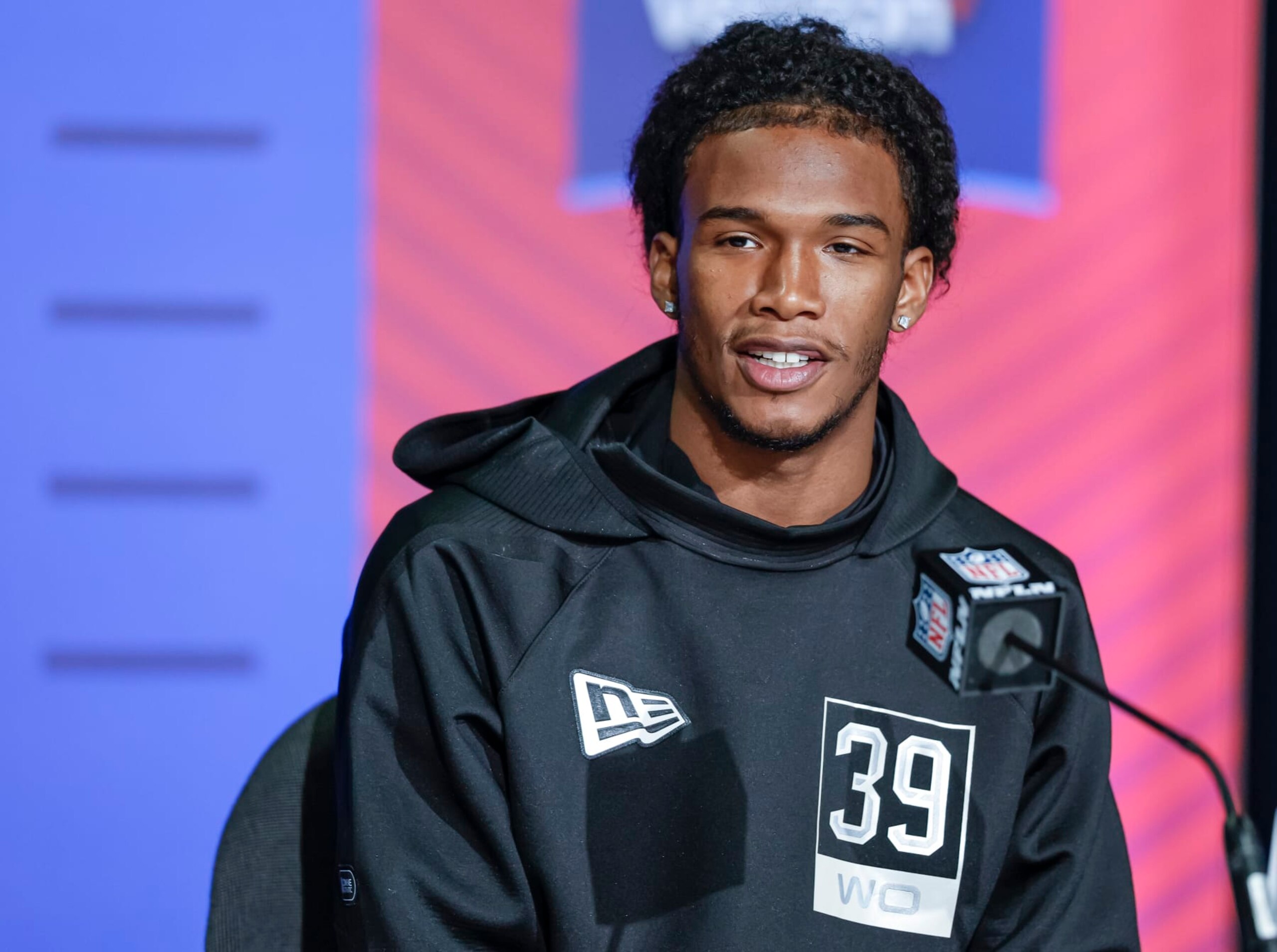INDIANAPOLIS, IN - MAR 02: Garrett Wilson #WO39 of the Ohio State Buckeyes speaks to reporters during the NFL Draft Combine at the Indiana Convention Center on March 2, 2022 in Indianapolis, Indiana. (Photo by Michael Hickey/Getty Images)