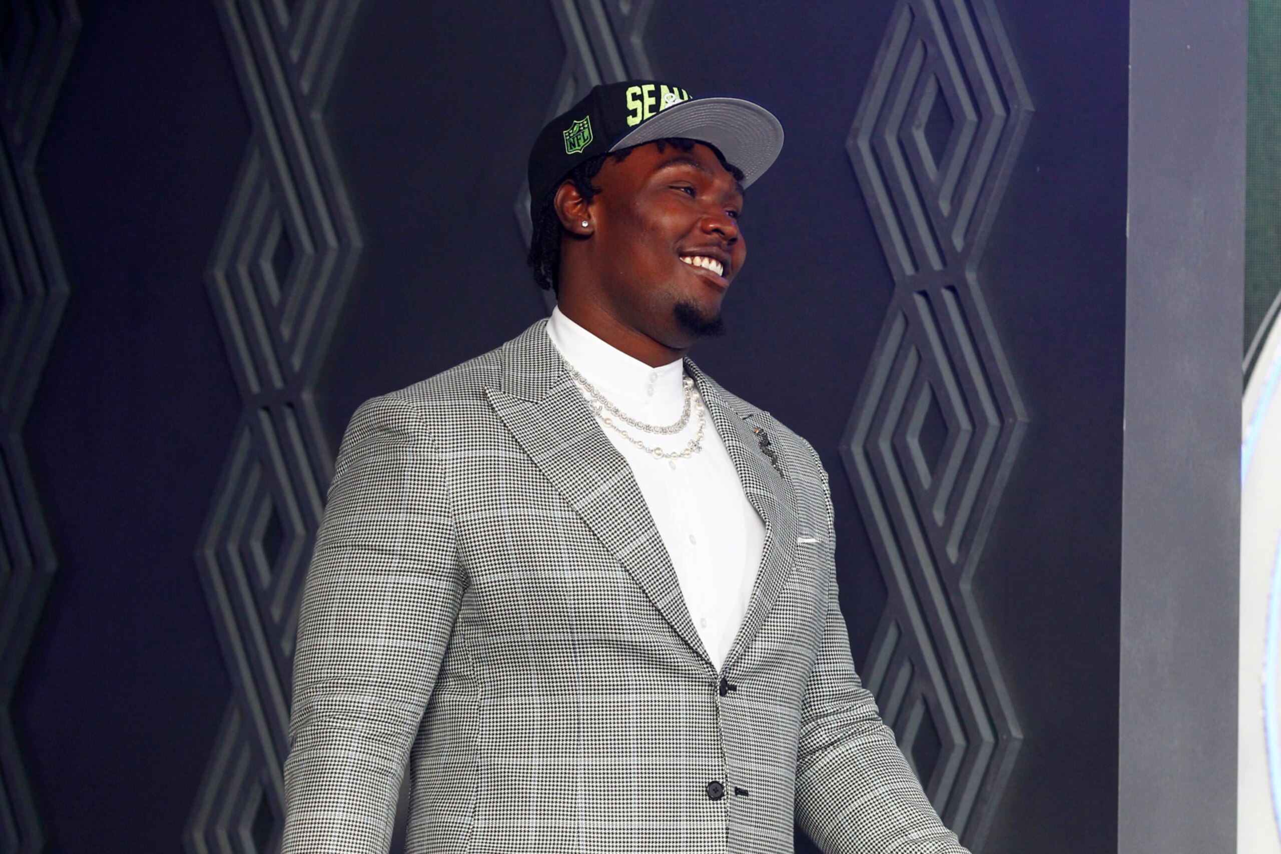 LAS VEGAS, NV - APRIL 28: Charles Cross, Mississippi State is selected as the number nine pick by the Seattle Seahawks during the NFL Draft on April 28, 2022 in Las Vegas, Nevada. (Photo by Jeff Speer/Icon Sportswire via Getty Images)