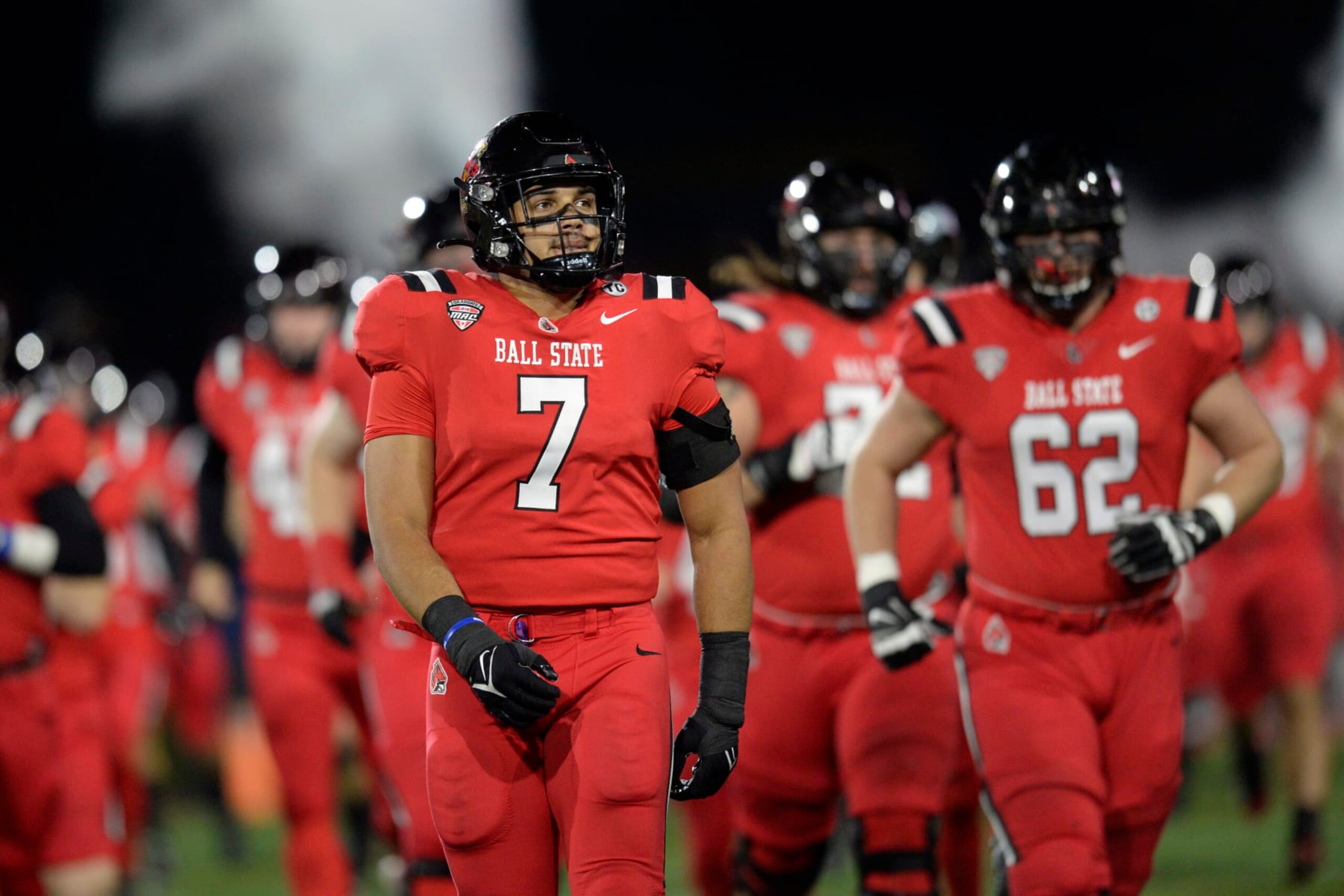 MUNCIE, IN - NOVEMBER 17: Ball State Cardinals inside linebacker Brandon Martin (7) leads the team onto the field for the start of the college football game between the Central Michigan Chippewas and the Ball State Cardinals on November 17, 2021, at Scheumann Stadium in Muncie, Indiana. (Photo by Michael Allio/Icon Sportswire via Getty Images)
