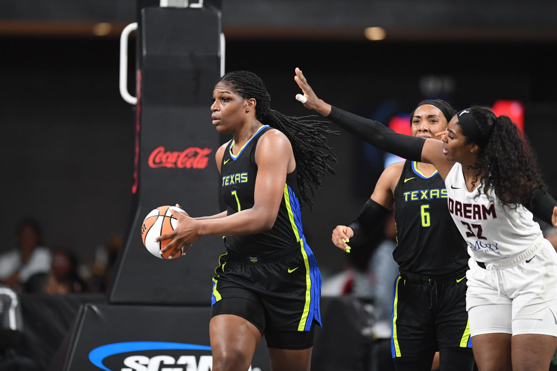 COLLEGE PARK, GA - JULY 30: Teaira McCowan #7 of the Dallas Wings looks to pass the ball during the game against the Atlanta Dream on July 30, 2022 at Gateway Center Arena in College Park, Georgia.  NOTE TO USER: User expressly acknowledges and agrees that, by downloading and/or using this Photograph, user is consenting to the terms and conditions of the Getty Images License Agreement. Mandatory Copyright Notice: Copyright 2022 NBAE (Photo by Adam Hagy/NBAE via Getty Images)