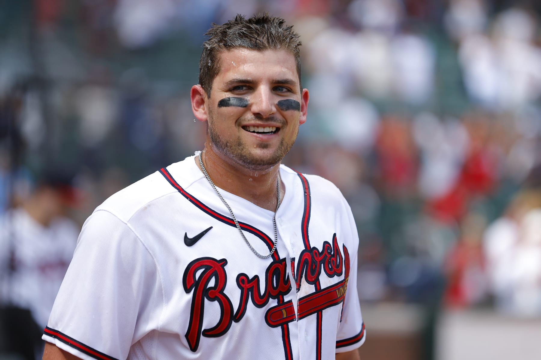 ATLANTA, GA - JULY 31: Austin Riley #27 of the Atlanta Braves reacts after being doused following his walk off double during the ninth inning against the Arizona Diamondbacks at Truist Park on July 31, 2022 in Atlanta, Georgia. (Photo by Todd Kirkland/Getty Images)