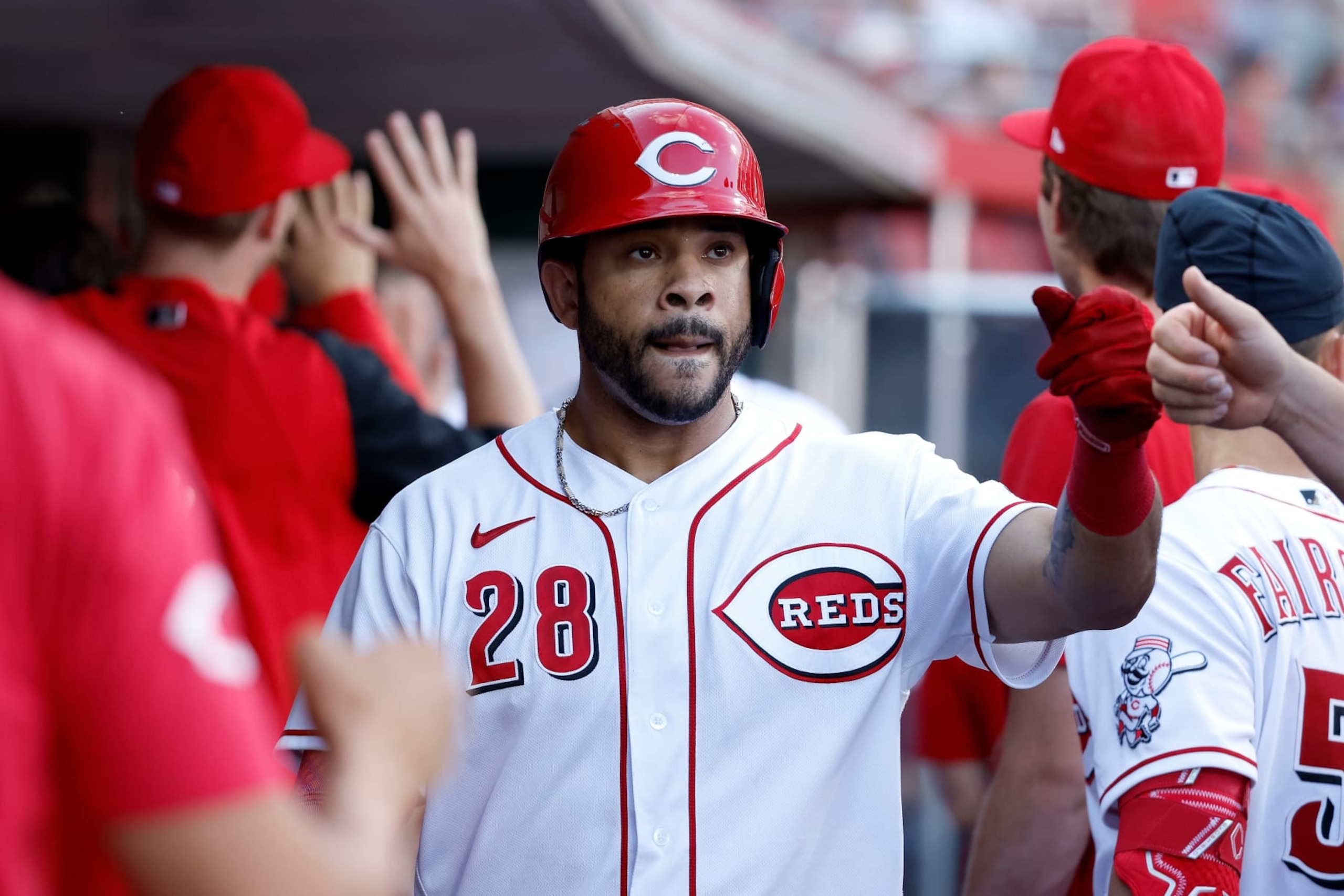 CINCINNATI, OH - JULY 27: Tommy Pham #28 of the Cincinnati Reds is congratulated by his teammates after scoring a run during the first inning of the game against the Miami Marlins at Great American Ball Park on July 27, 2022 in Cincinnati, Ohio. (Photo by Kirk Irwin/Getty Images) CINCINNATI, OH - JULY 27: Tommy Pham #28 of the Cincinnati Reds is congratulated by his teammates after scoring a run during the first inning of the game against the Miami Marlins at Great American Ball Park on July 27, 2022 in Cincinnati, Ohio. (Photo by Kirk Irwin/Getty Images)