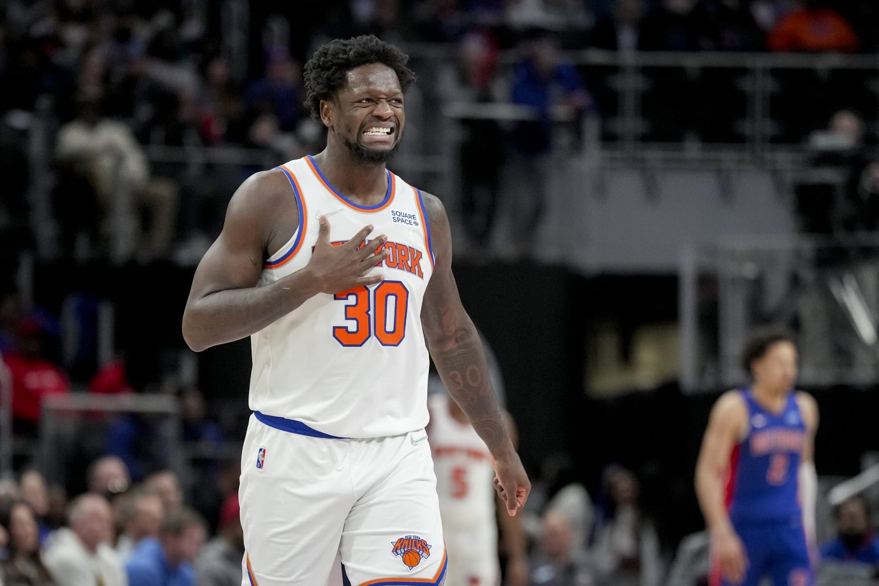 DETROIT, MICHIGAN - MARCH 27: Julius Randle #30 of the New York Knicks reacts against the Detroit Pistons during the fourth quarter at Little Caesars Arena on March 27, 2022 in Detroit, Michigan. NOTE TO USER: User expressly acknowledges and agrees that, by downloading and or using this photograph, User is consenting to the terms and conditions of the Getty Images License Agreement. (Photo by Nic Antaya/Getty Images)