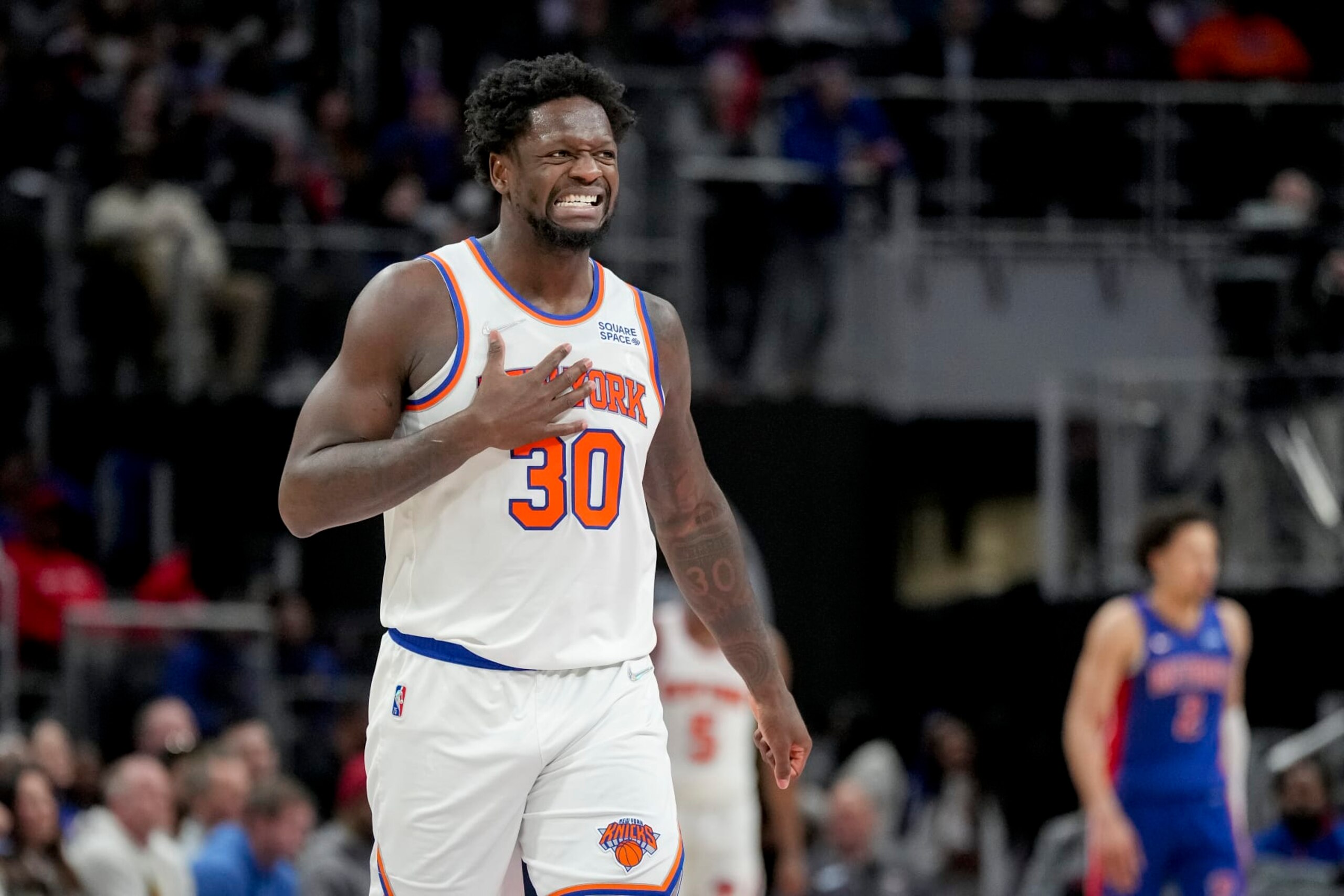 DETROIT, MICHIGAN - MARCH 27: Julius Randle #30 of the New York Knicks reacts against the Detroit Pistons during the fourth quarter at Little Caesars Arena on March 27, 2022 in Detroit, Michigan. NOTE TO USER: User expressly acknowledges and agrees that, by downloading and or using this photograph, User is consenting to the terms and conditions of the Getty Images License Agreement. (Photo by Nic Antaya/Getty Images)