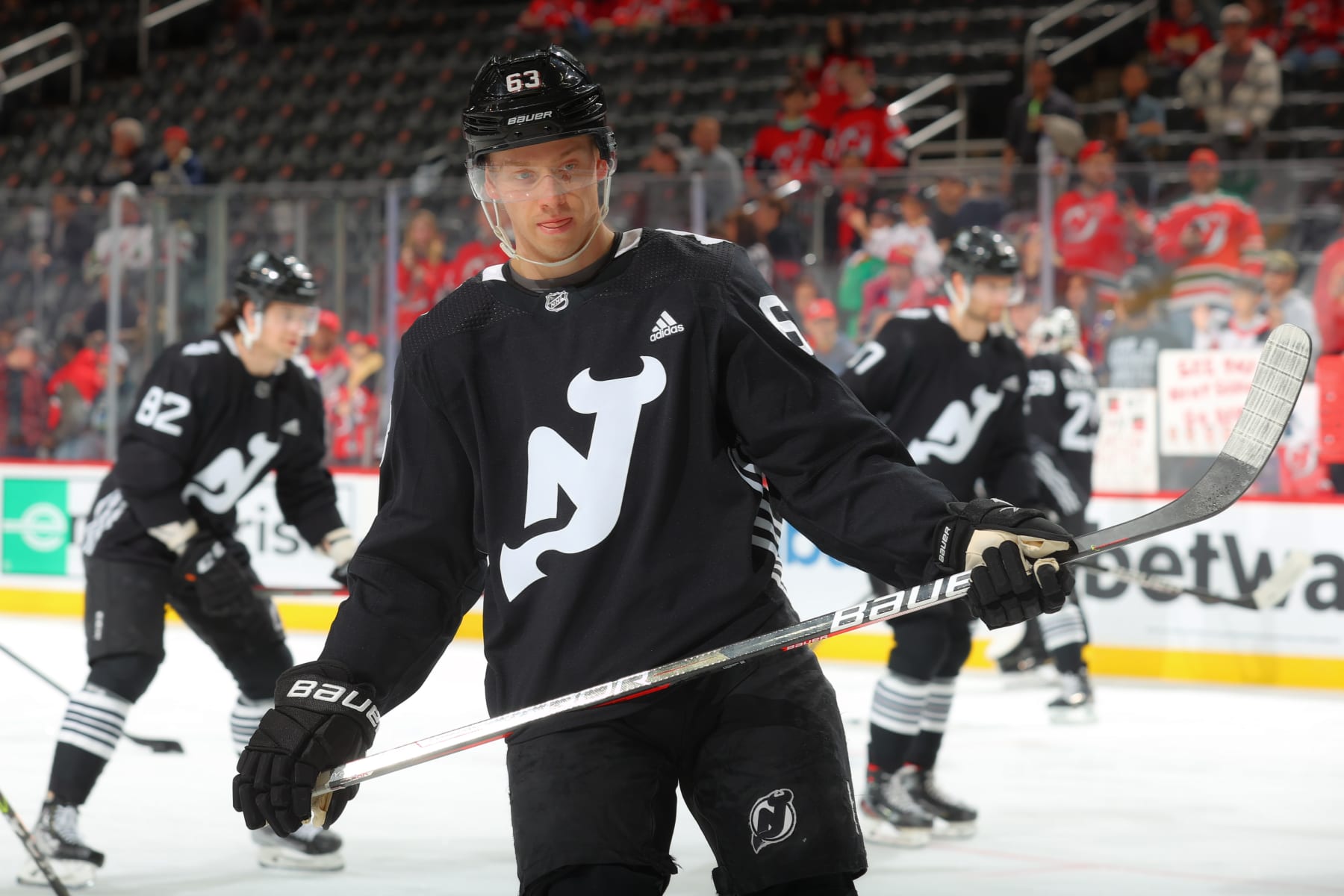 NEWARK, NJ - APRIL  29:  Jesper Bratt #63 of the New Jersey Devils warms up prior to the game against the Detroit Red Wings on April 29, 2022 at the Prudential Center in Newark, New Jersey.  (Photo by Rich Graessle/Getty Images)