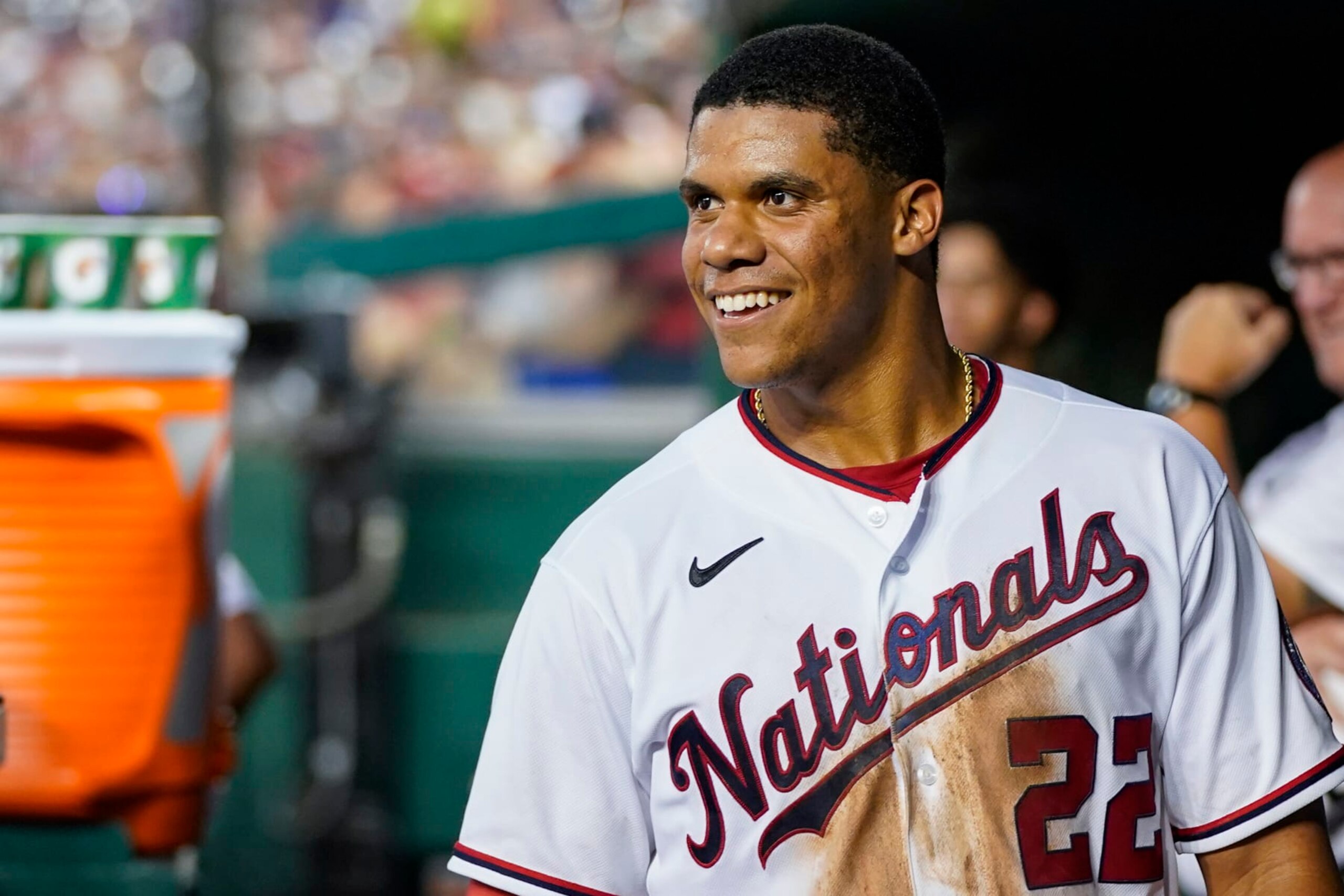 Washington Nationals' Juan Soto smiles in the dugout after a solo home run during a baseball game against the New York Mets at Nationals Park, Monday, Aug. 1, 2022, in Washington. (AP Photo/Alex Brandon) Washington Nationals' Juan Soto smiles in the dugout after a solo home run during a baseball game against the New York Mets at Nationals Park, Monday, Aug. 1, 2022, in Washington. (AP Photo/Alex Brandon)