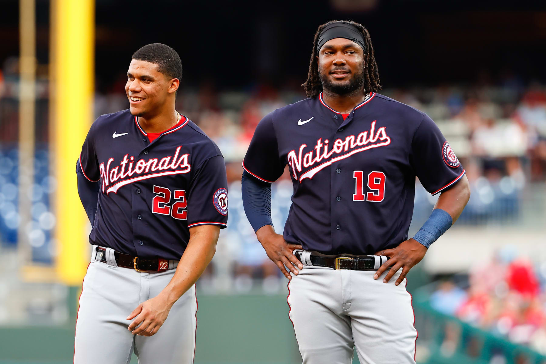PHILADELPHIA, PA - JULY 07:  Washington Nationals right fielder Juan Soto (22) and Washington Nationals first baseman Josh Bell (19) during the Major League Baseball game between the Philadelphia Phillies and the Washington Nationals on July 7, 2022 at Citizens Bank Park in Philadelphia, Pennsylvania.  (Photo by Rich Graessle/Icon Sportswire via Getty Images)