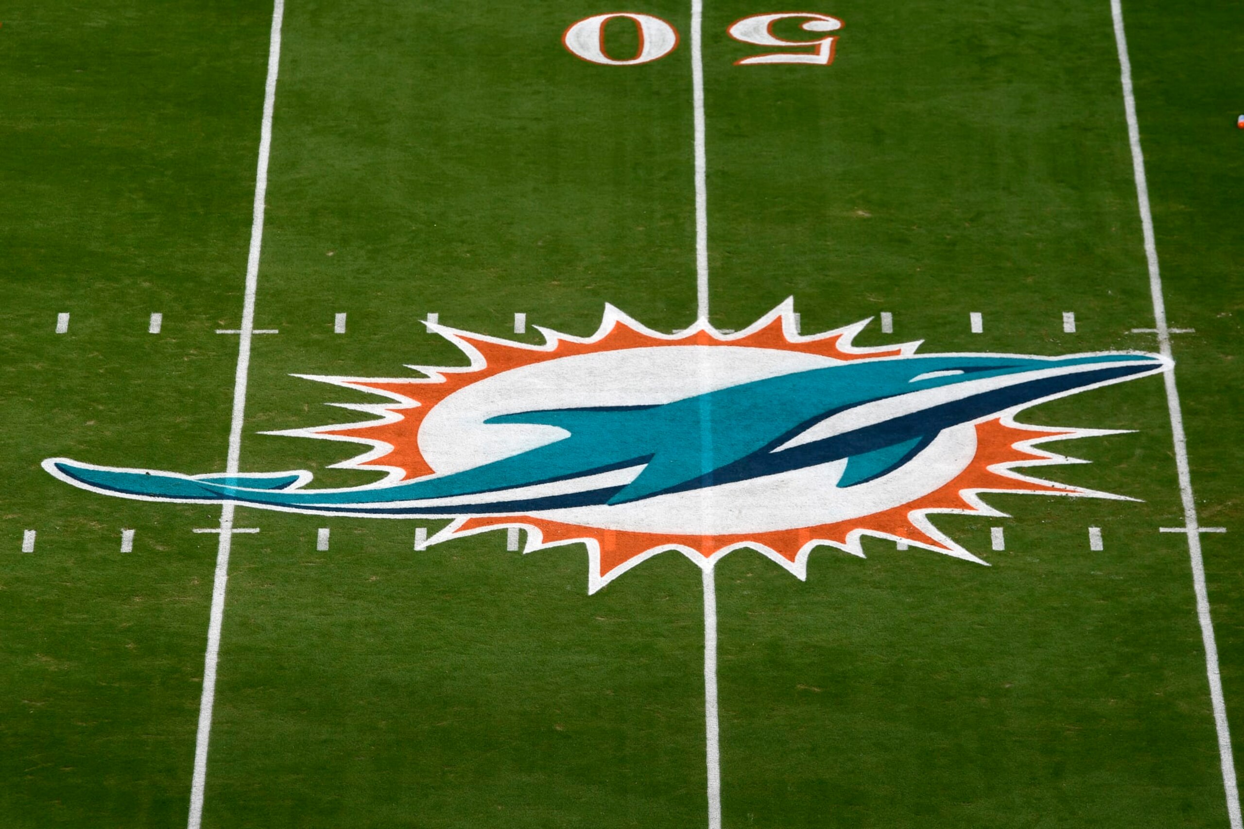 MIAMI GARDENS, FL - DECEMBER 05: The Miami Dolphins logo is seen at mid-field before the NFL football game between the New York Giants and the Miami Dolphins on December 5, 2021, at Hard Rock Stadium in Miami Gardens, Florida. (Photo by Michael Allio/Icon Sportswire via Getty Images)