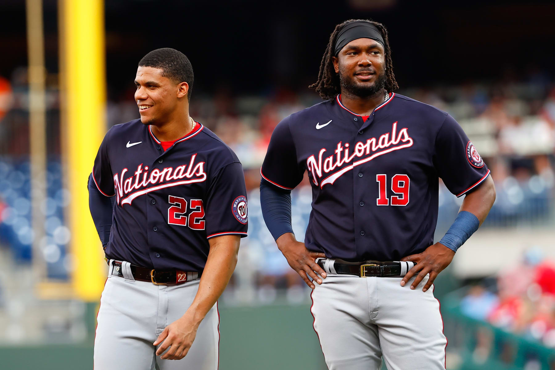 PHILADELPHIA, PA - JULY 07:  Washington Nationals right fielder Juan Soto (22) and Washington Nationals first baseman Josh Bell (19) during the Major League Baseball game between the Philadelphia Phillies and the Washington Nationals on July 7, 2022 at Citizens Bank Park in Philadelphia, Pennsylvania.  (Photo by Rich Graessle/Icon Sportswire via Getty Images)