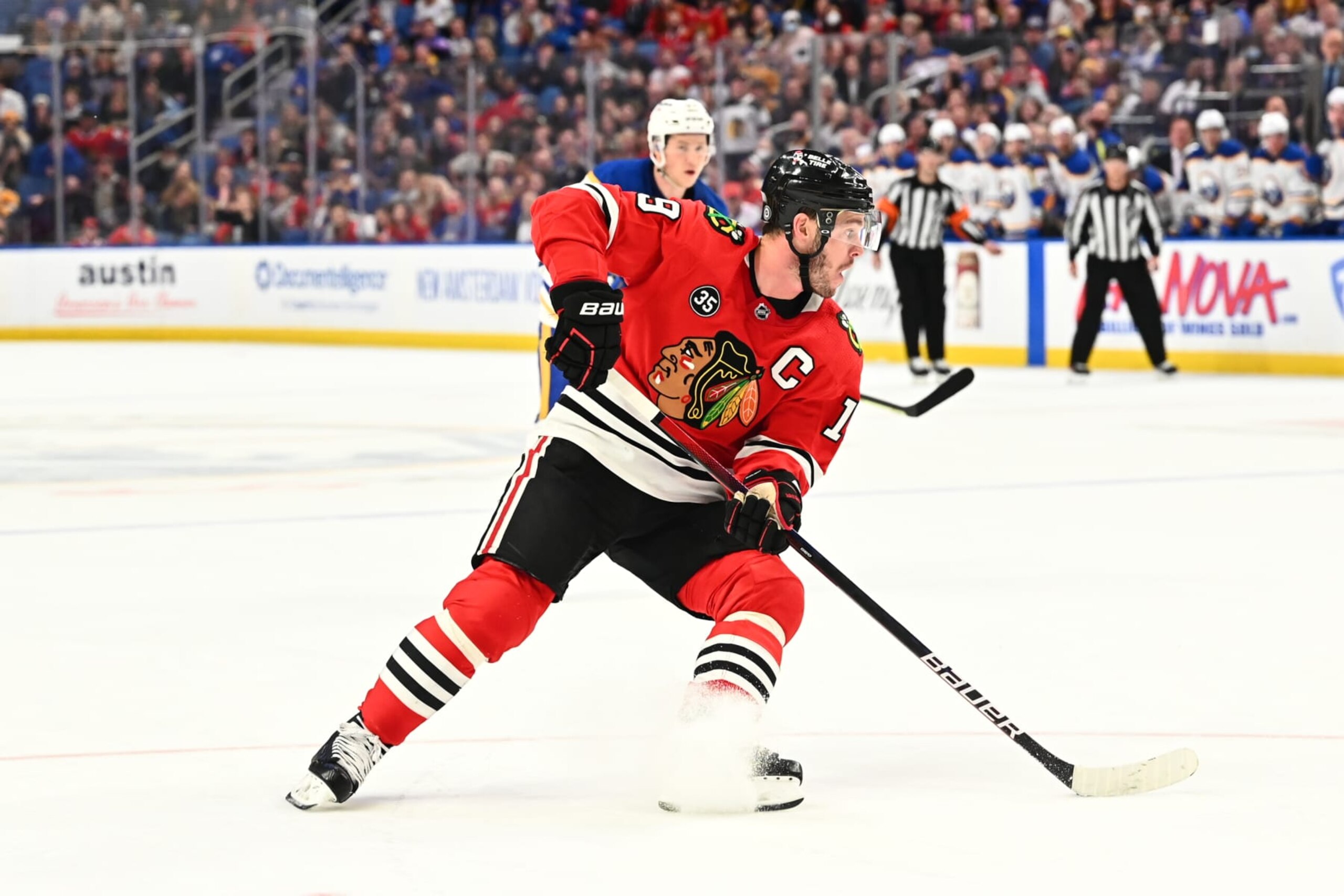 BUFFALO, NY - APRIL 29: Jonathan Toews #19 of the Chicago Blackhawks controls the puck against the Buffalo Sabres during an NHL game on April 29, 2022 at KeyBank Center in Buffalo, New York. Buffalo won, 3-2 in overtime. (Photo by Joe Hrycych/NHLI via Getty Images) BUFFALO, NY - APRIL 29: Jonathan Toews #19 of the Chicago Blackhawks controls the puck against the Buffalo Sabres during an NHL game on April 29, 2022 at KeyBank Center in Buffalo, New York. Buffalo won, 3-2 in overtime. (Photo by Joe Hrycych/NHLI via Getty Images)