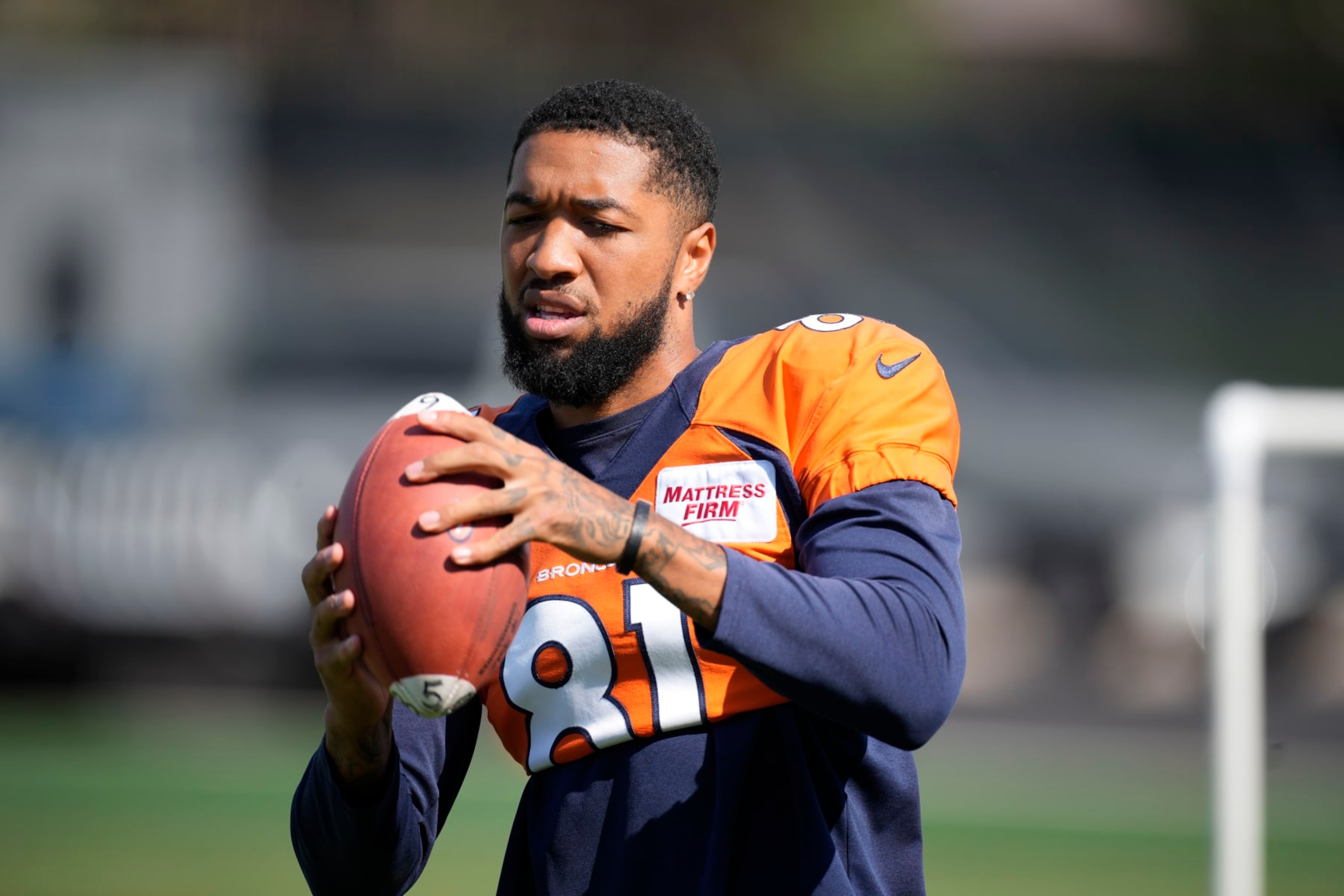 Denver Broncos wide receiver Tim Patrick (81) takes part in drills during the NFL football team's training camp Monday, Aug. 1, 2022, at the team's headquarters in Centennial, Colo. (AP Photo/David Zalubowski)