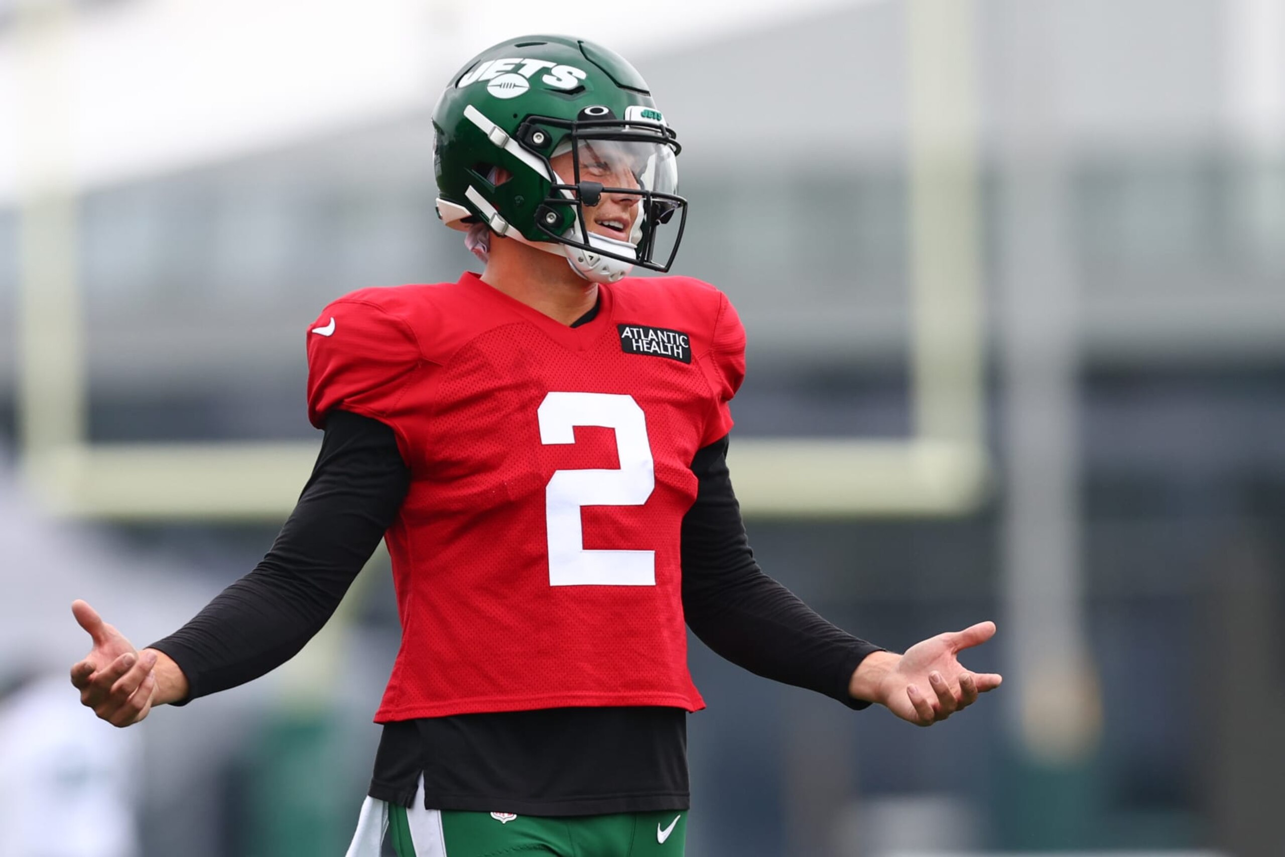 FLORHAM PARK, NJ - AUGUST 01: Quarterback Zach Wilson #2 of the New York Jets gestures during training camp at Atlantic Health Jets Training Center on August 1, 2022 in Florham Park, New Jersey. (Photo by Rich Schultz/Getty Images)