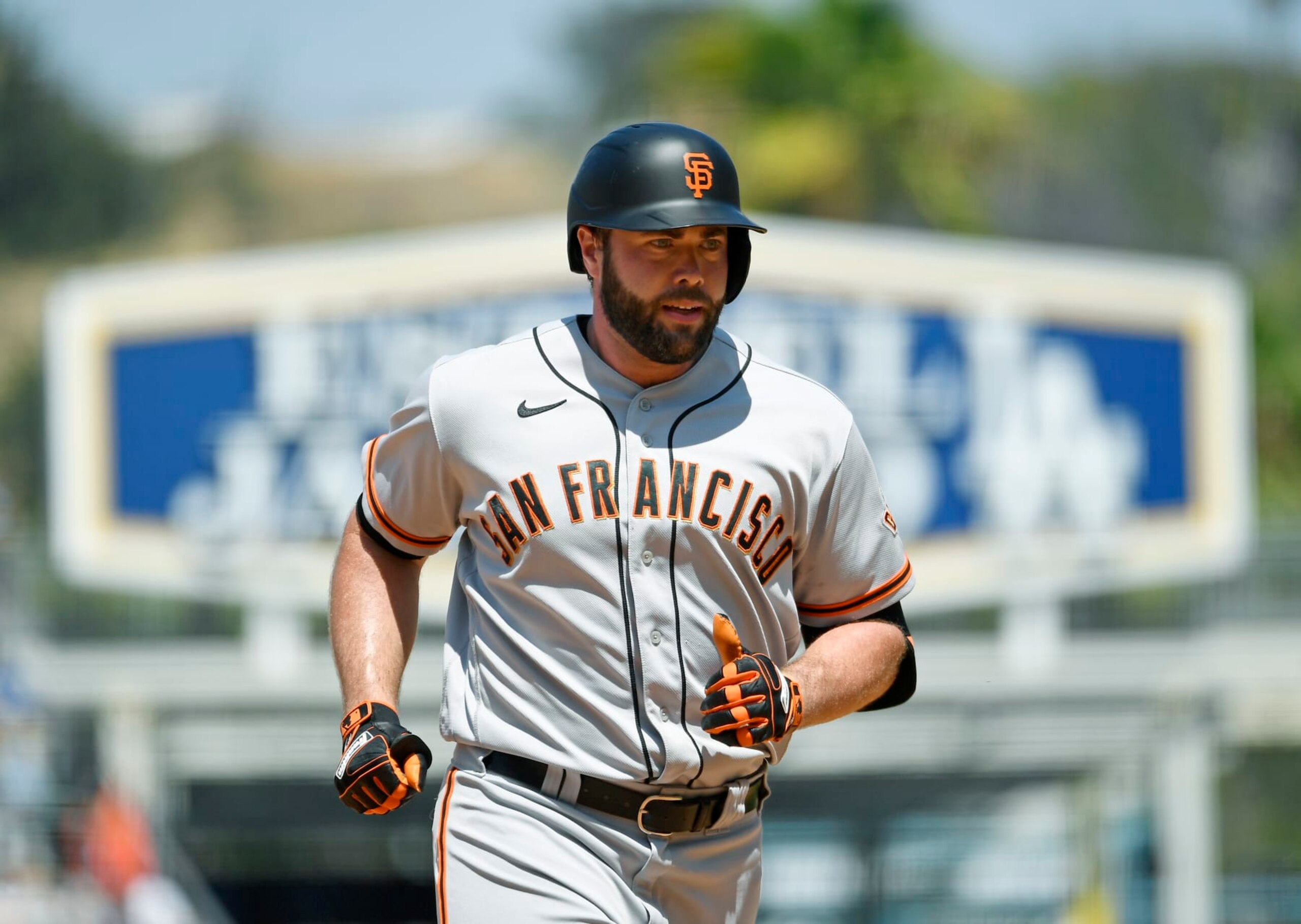 LOS ANGELES, CA - JULY 24: Darin Ruf #33 of the San Francisco Giants runs the bases after hitting a two-run home run against starting pitcher Clayton Kershaw #22 of the Los Angeles Dodgers during the fifth inning at Dodger Stadium on July 24, 2022 in Los Angeles, California. (Photo by Kevork Djansezian/Getty Images)
