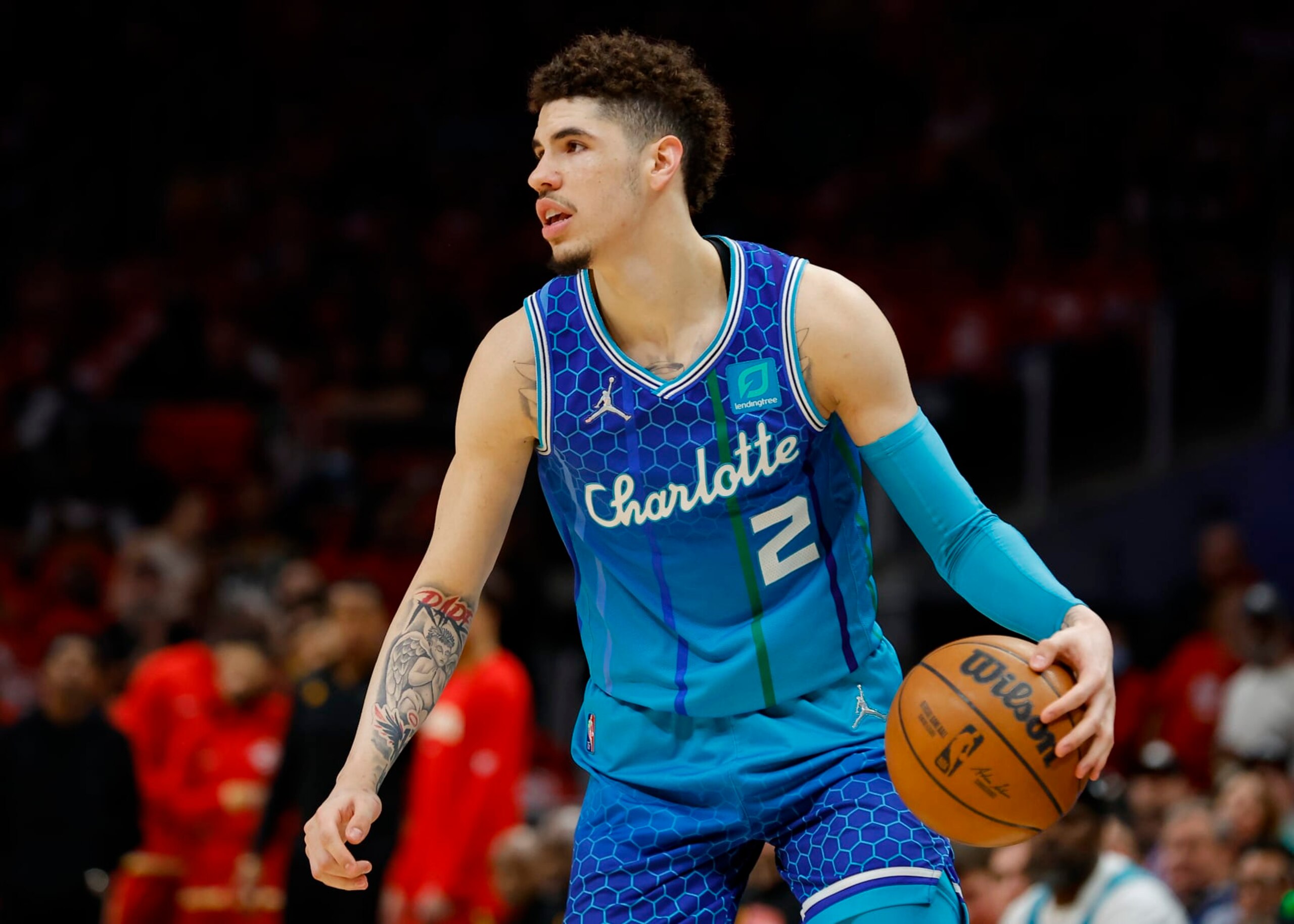 ATLANTA, GA - APRIL 13: LaMelo Ball #2 of the Charlotte Hornets during the first half against the Atlanta Hawks at State Farm Arena on April 13, 2022 in Atlanta, Georgia. NOTE TO USER: User expressly acknowledges and agrees that, by downloading and or using this photograph, User is consenting to the terms and conditions of the Getty Images License Agreement. (Photo by Todd Kirkland/Getty Images) ATLANTA, GA - APRIL 13: LaMelo Ball #2 of the Charlotte Hornets during the first half against the Atlanta Hawks at State Farm Arena on April 13, 2022 in Atlanta, Georgia. NOTE TO USER: User expressly acknowledges and agrees that, by downloading and or using this photograph, User is consenting to the terms and conditions of the Getty Images License Agreement. (Photo by Todd Kirkland/Getty Images)