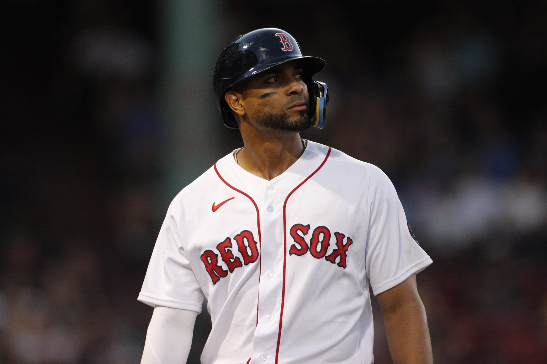 Boston, MA - July 30: Boston Red Sox shortstop Xander Bogaerts walks off the field at the bottom of the eighth inning at the game between the Boston Red Sox and the Milwaukee Brewers. The Brewers defeated the Red Sox, 9-4. (Photo by Carlin Stiehl for The Boston Globe via Getty Images)