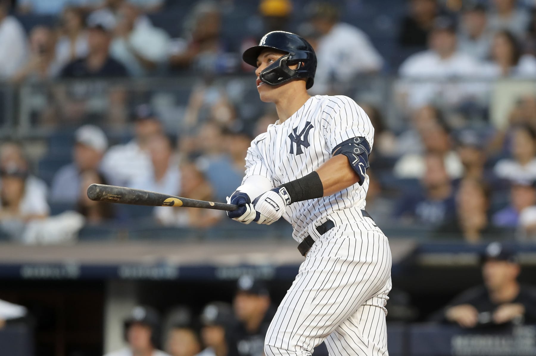 NEW YORK, NEW YORK - AUGUST 01:  Aaron Judge #99 of the New York Yankees follows through on his second inning two run home run against the Seattle Mariners at Yankee Stadium on August 01, 2022 in New York City. (Photo by Jim McIsaac/Getty Images)