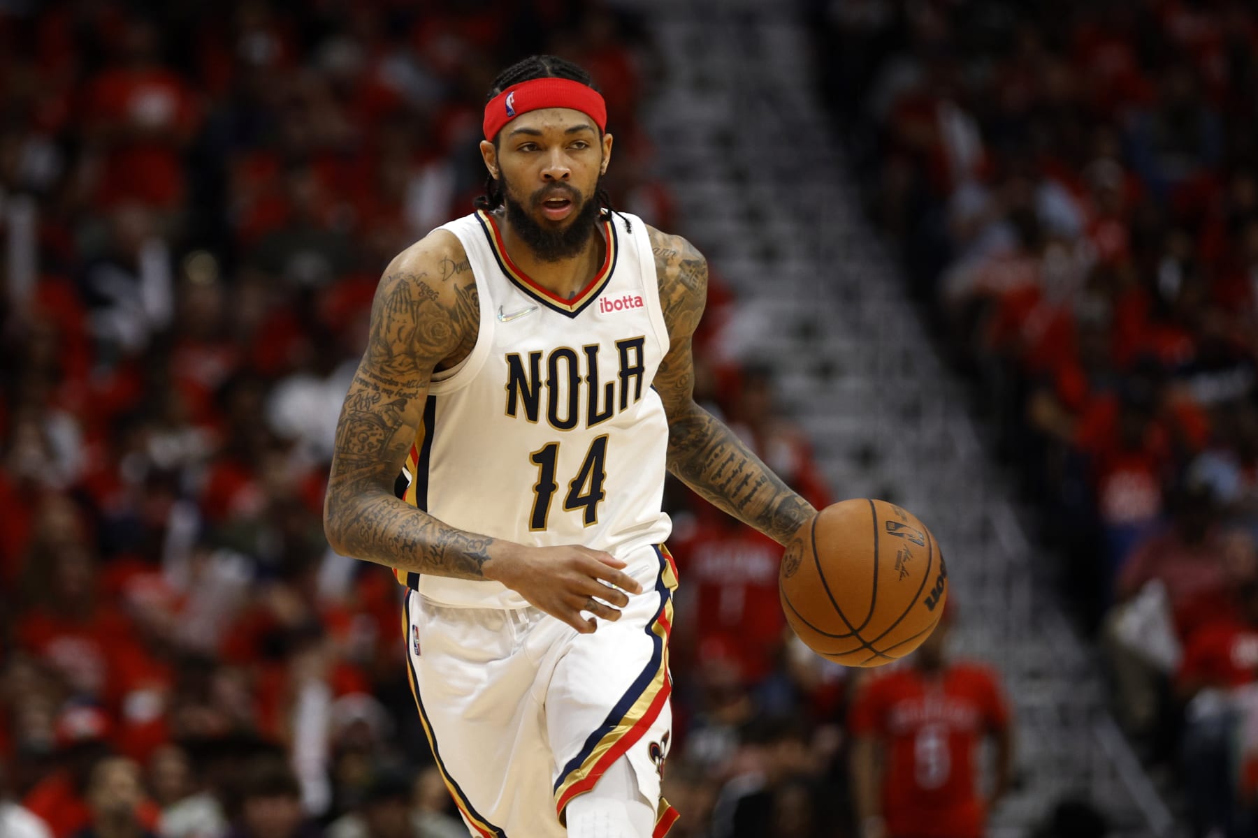 NEW ORLEANS, LOUISIANA - APRIL 28: Brandon Ingram #14 of the New Orleans Pelicans drives the ball against the Phoenix Suns at Smoothie King Center on April 28, 2022 in New Orleans, Louisiana.  NOTE TO USER: User expressly acknowledges and agrees that, by downloading and or using this Photograph, user is consenting to the terms and conditions of the Getty Images License Agreement.  (Photo by Chris Graythen/Getty Images)