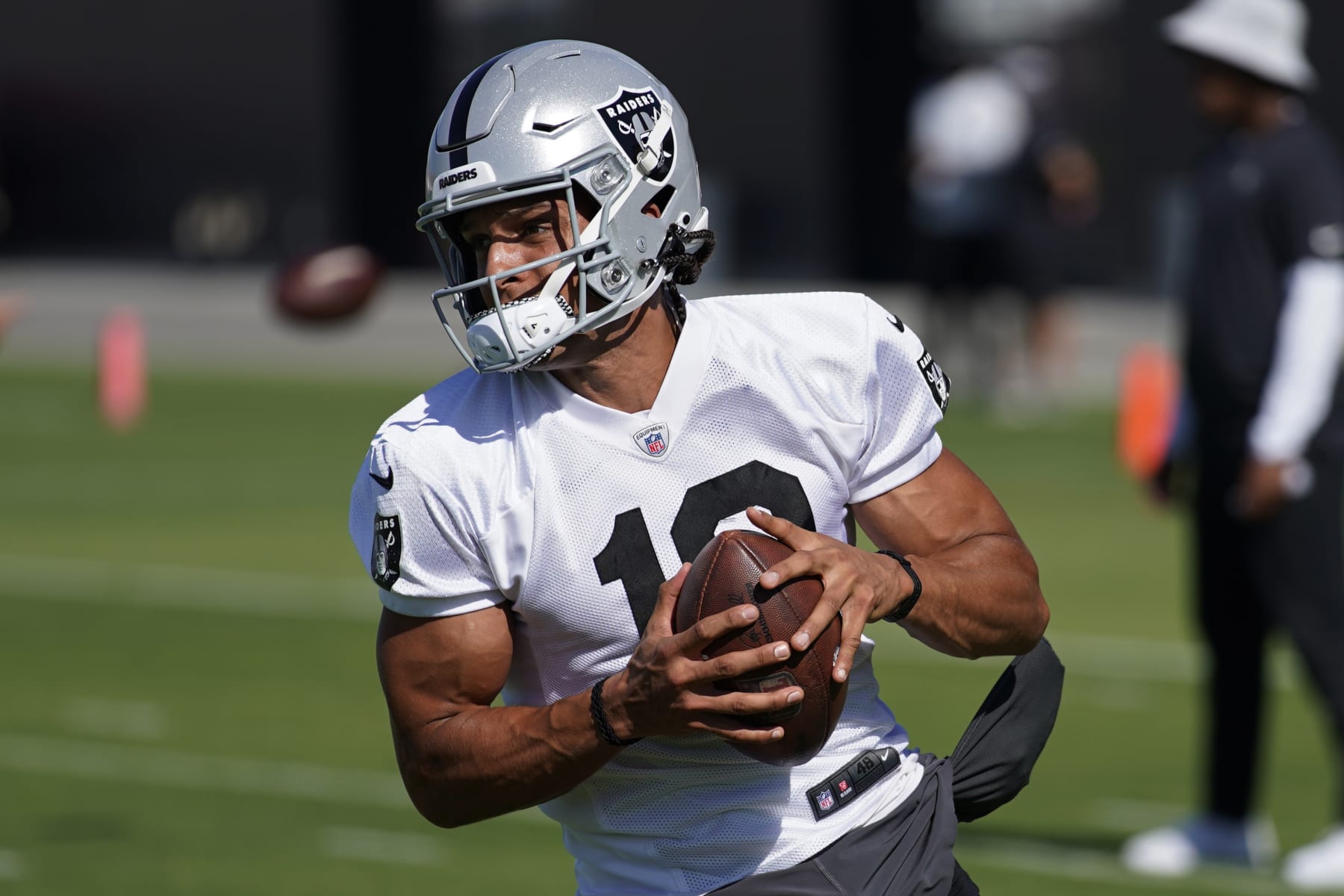 Las Vegas Raiders' Mack Hollins practices during NFL football training camp, Thursday, July 21, 2022, in Henderson, Nev. (AP Photo/John Locher)