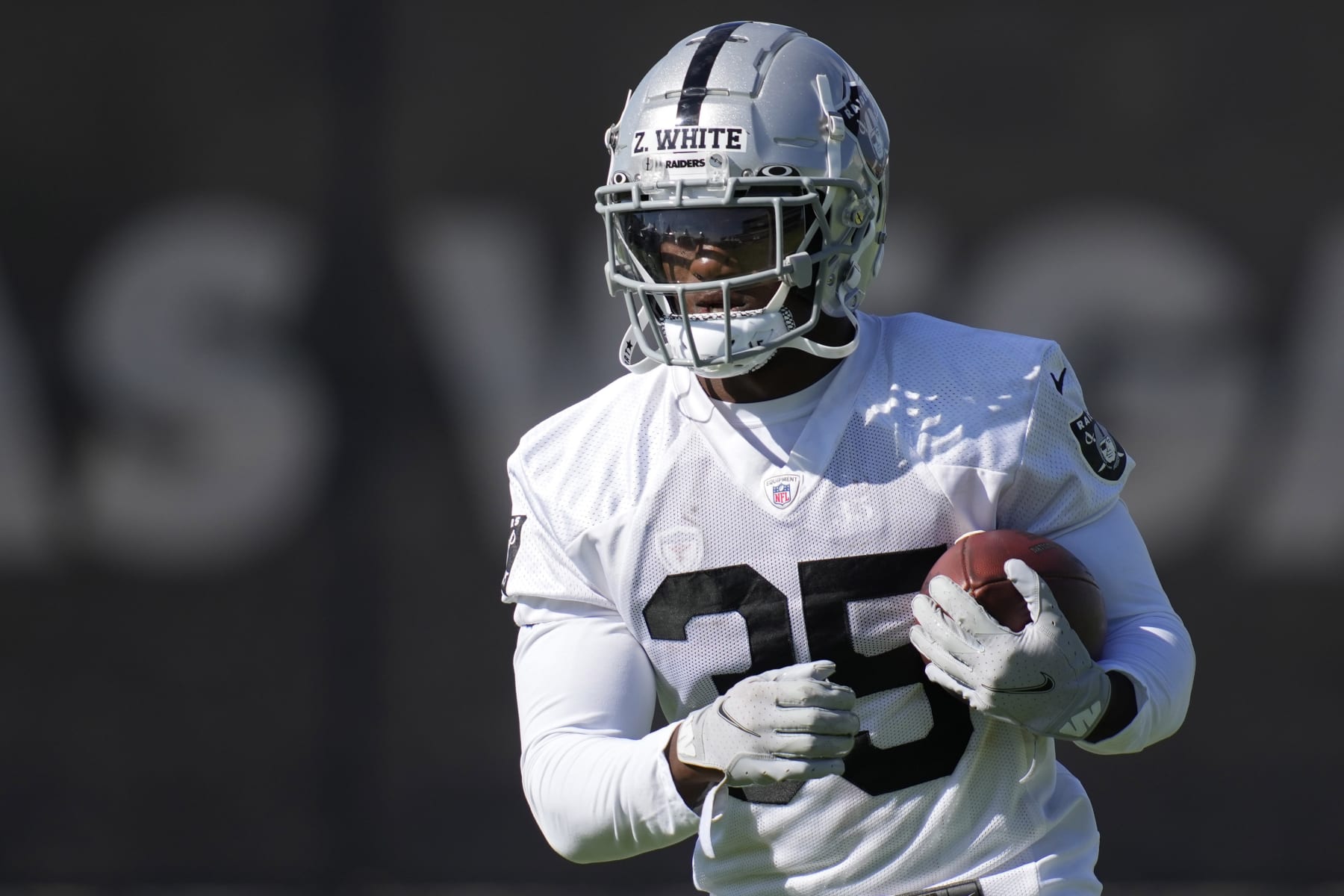 Las Vegas Raiders' Zamir White practices during NFL football training camp, Monday, Aug. 1, 2022, in Henderson, Nev. (AP Photo/John Locher)