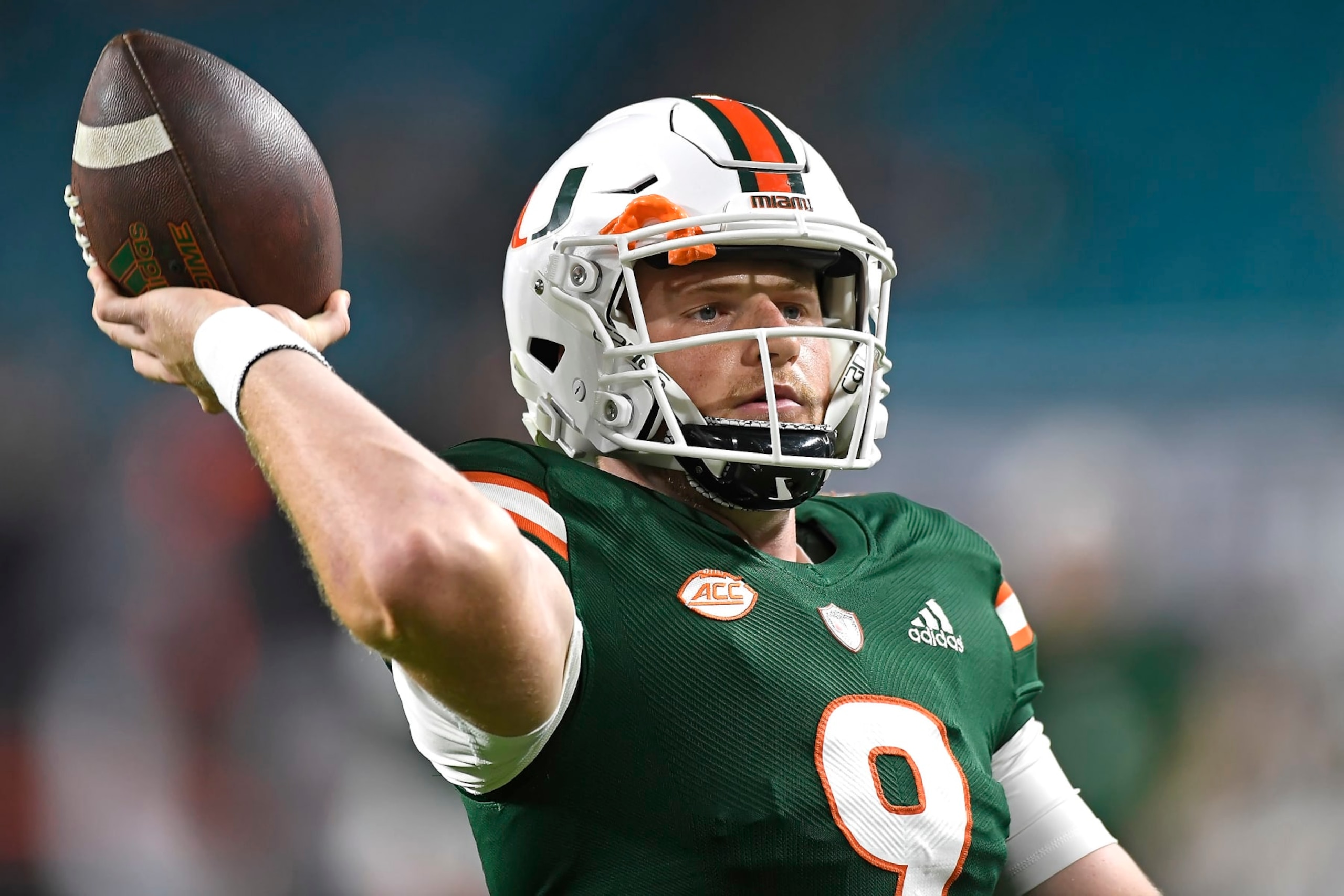 MIAMI GARDENS, FL - NOVEMBER 20:  Miami quarterback Tyler Van Dyke (9) warms up prior to the game as the University of Miami Hurricanes faced the Virginia Tech Hokies on November 20, 2021, at Hard Rock Stadium in Miami Gardens, Florida. (Photo by Samuel Lewis/Icon Sportswire via Getty Images)