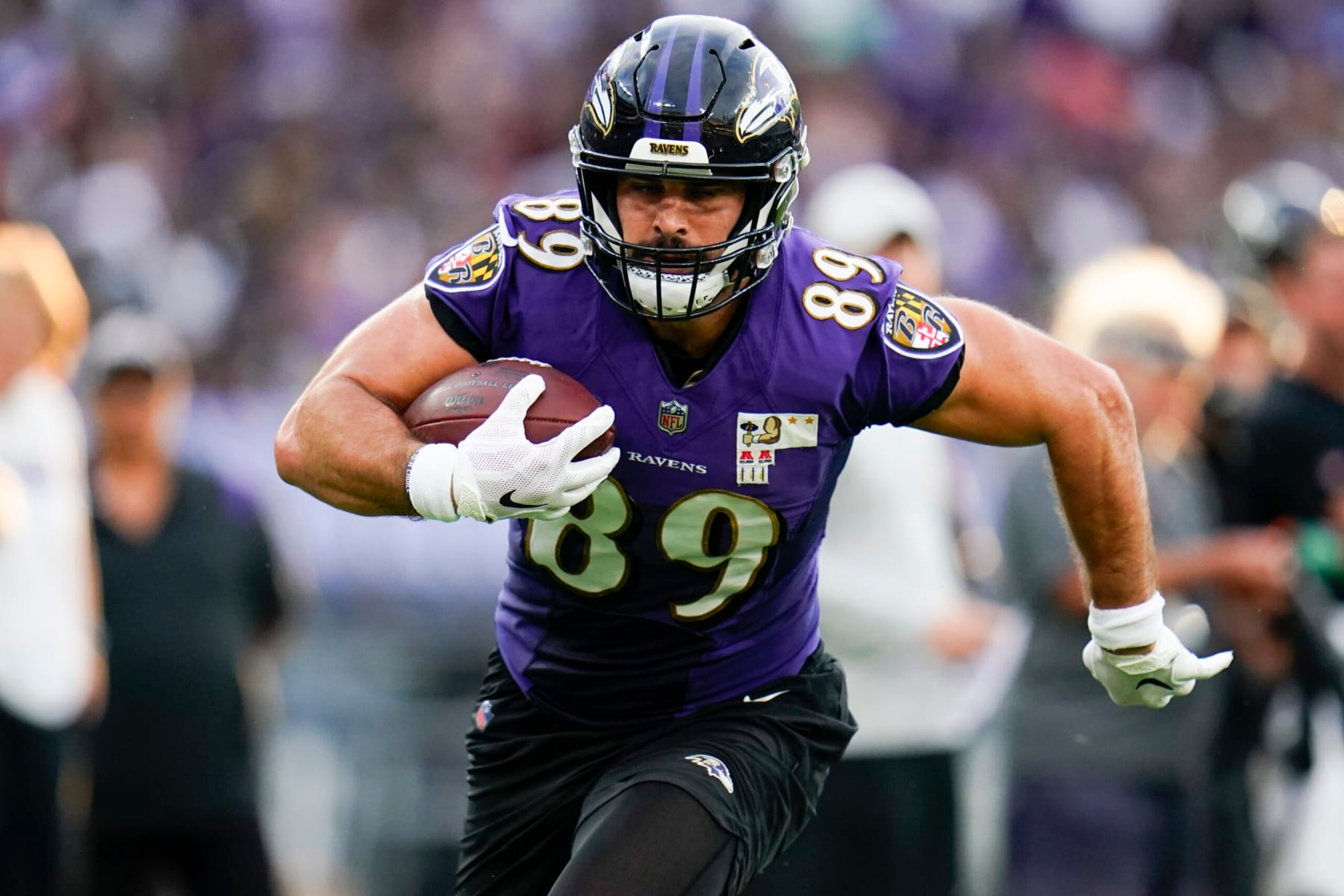Baltimore Ravens tight end Mark Andrews works out during the team's NFL football training camp practice at M&T Stadium, Saturday, July 30, 2022, in Baltimore. (AP Photo/Julio Cortez)