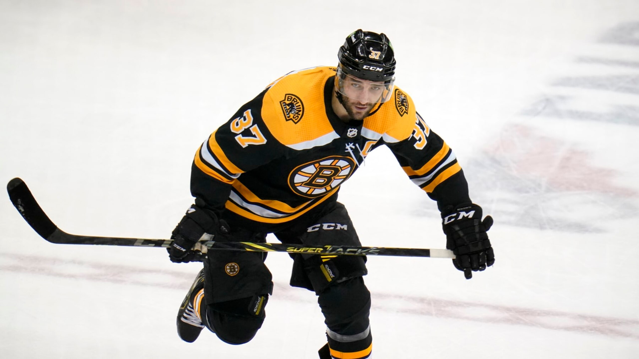 Boston Bruins center Patrice Bergeron plays during the third period of an NHL hockey game against the Pittsburgh Penguins in Pittsburgh, Thursday, April 21, 2022. The Penguins won 4-0.(AP Photo/Gene J. Puskar)