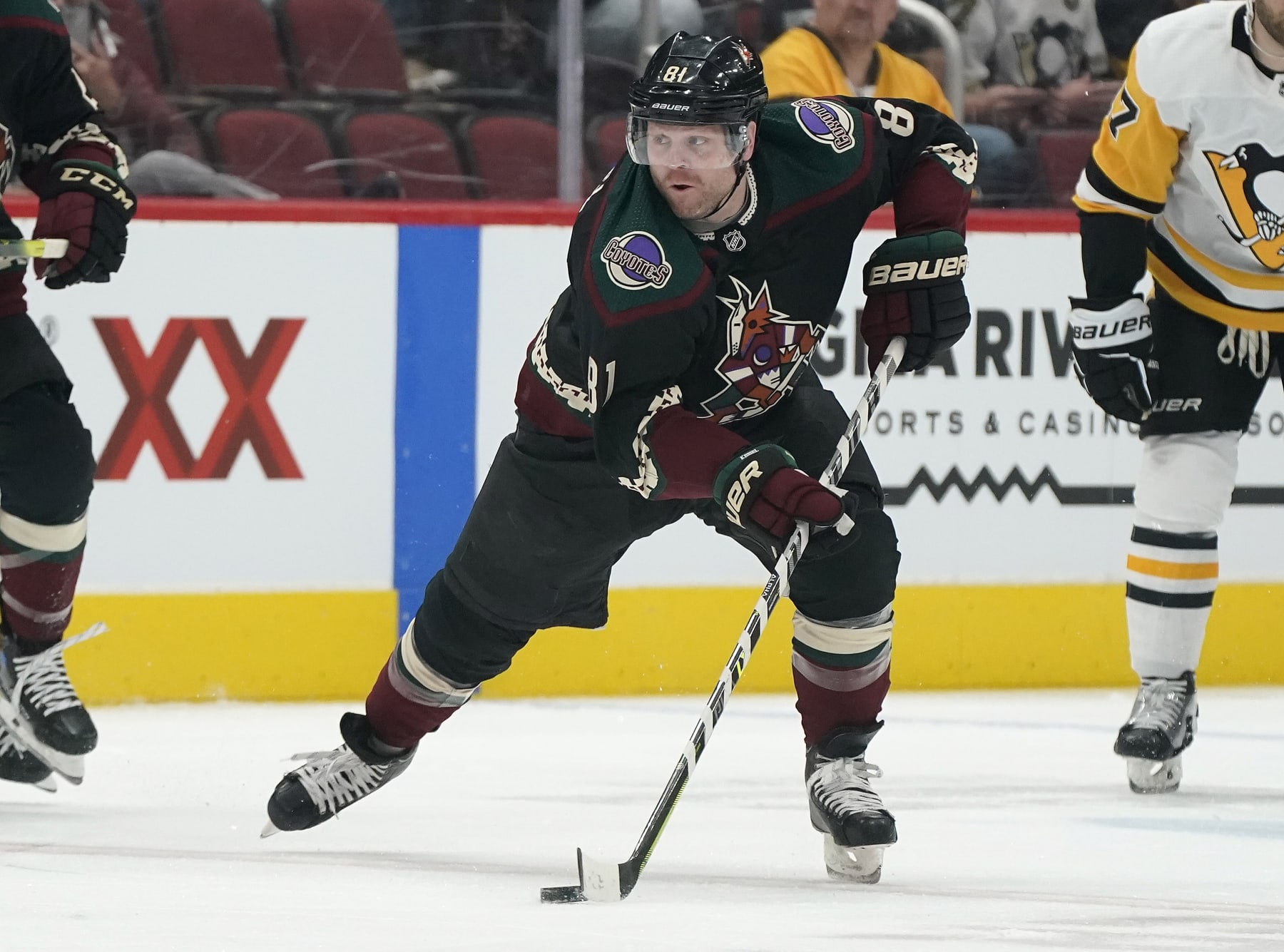Arizona Coyotes' Phil Kessel (81) skates up ice during their NHL hockey game against the Pittsburgh Penguins Saturday, March 19, 2022, in Glendale, Ariz. (AP Photo/Darryl Webb)