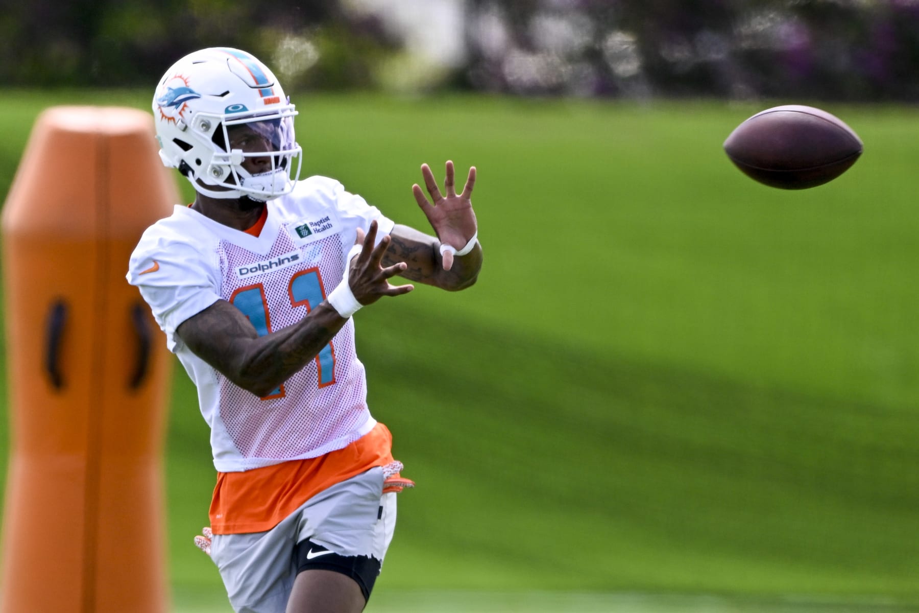 DAVIE, FL - JUNE 01: Miami Dolphins wide receiver Cedrick Wilson Jr. (11) catches the ball during the first mandatory  minicamp at the Baptist Health Training Complex on June 1, 2022, in Miami Gardens, Florida. (Photo by Doug Murray/Icon Sportswire via Getty Images)