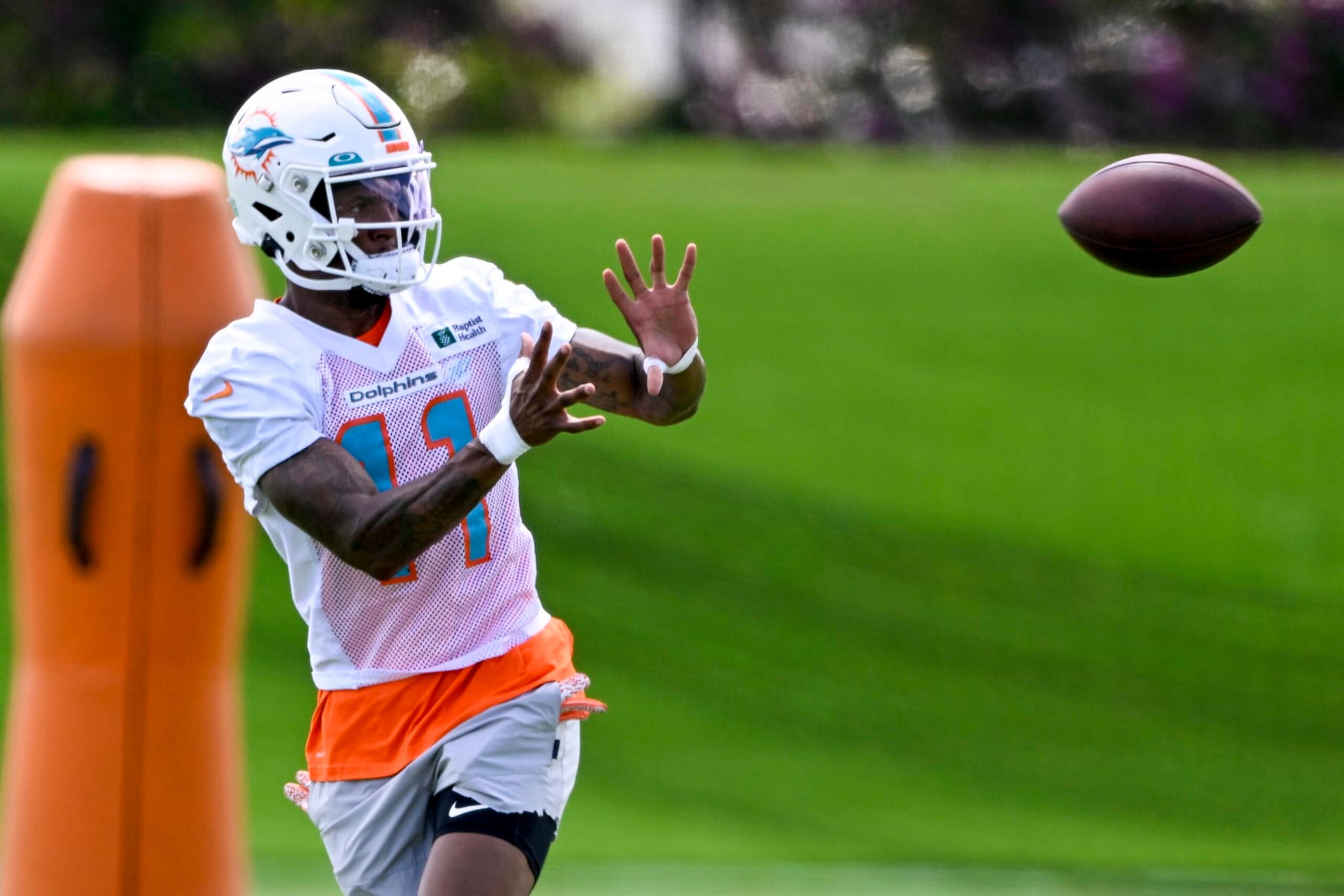 DAVIE, FL - JUNE 01: Miami Dolphins wide receiver Cedrick Wilson Jr. (11) catches the ball during the first mandatory  minicamp at the Baptist Health Training Complex on June 1, 2022, in Miami Gardens, Florida. (Photo by Doug Murray/Icon Sportswire via Getty Images)