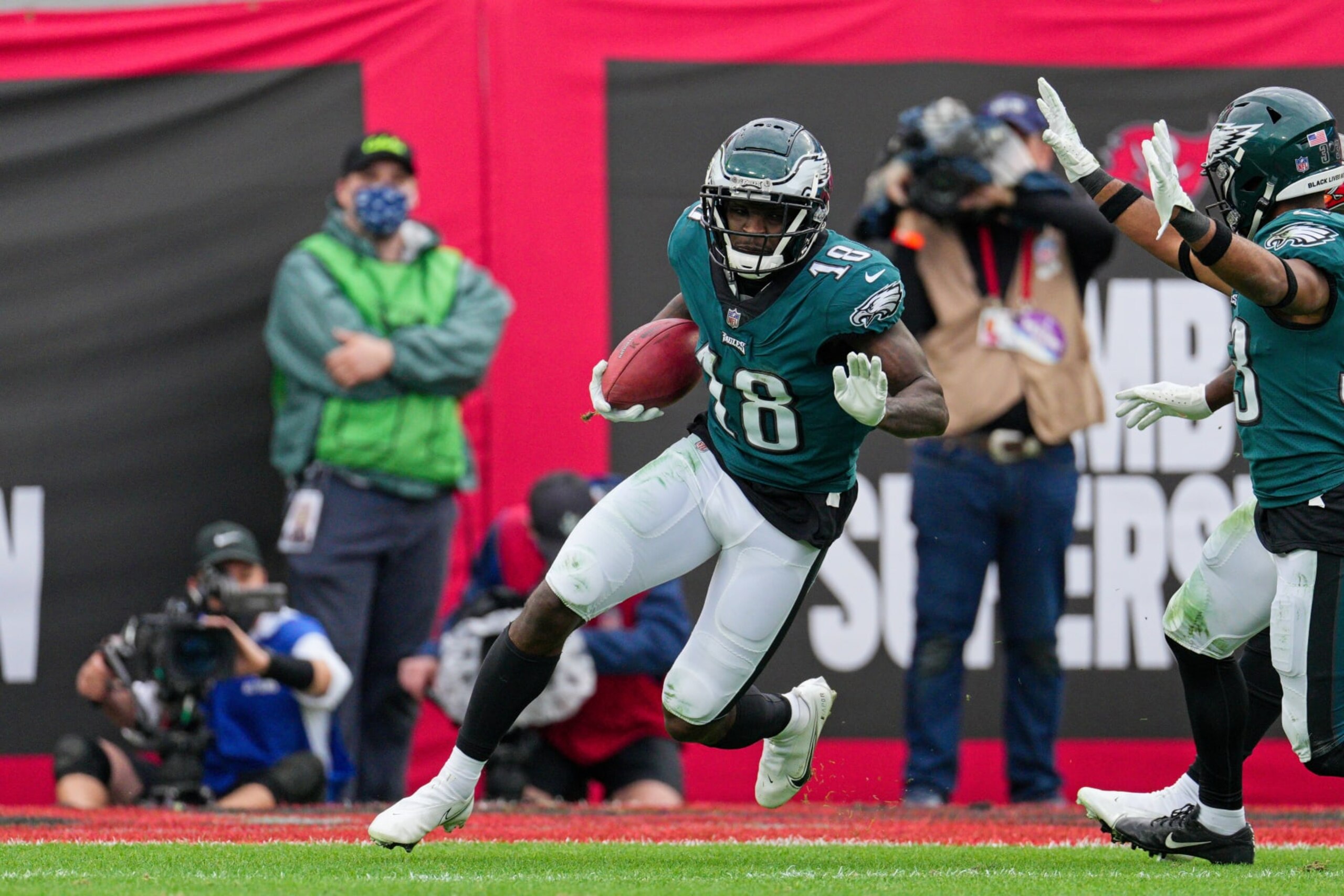 TAMPA, FL - JANUARY 16: Philadelphia Eagles wide receiver Jalen Reagor (18) runs after a punt reception during the game between the Philadelphia Eagles and the Tampa Bay Buccaneers on January 16, 2022 at  Raymond James Stadium in Tampa, FL. (Photo by Andy Lewis/Icon Sportswire via Getty Images)
