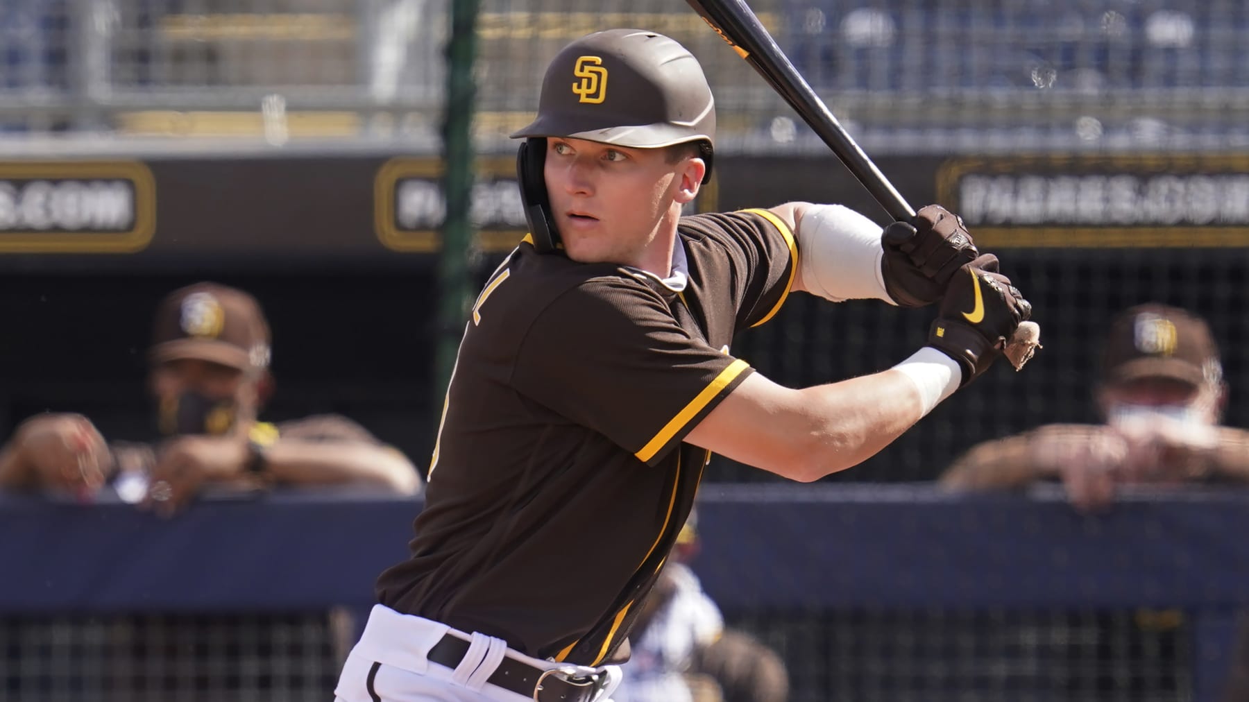 San Diego Padres' Robert Hassell III bats in a spring training baseball game against the Kansas City Royals, Sunday, March 7, 2021, in Peoria, Ariz. (AP Photo/Sue Ogrocki)