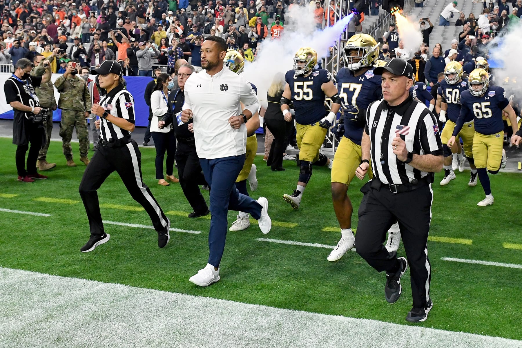 GLENDALE, ARIZONA - JANUARY 01: Head coach Marcus Freeman of the Notre Dame Fighting Irish takes the field before the PlayStation Fiesta Bowl against the Oklahoma State Cowboys at State Farm Stadium on January 01, 2022 in Glendale, Arizona. (Photo by Norm Hall/Getty Images)