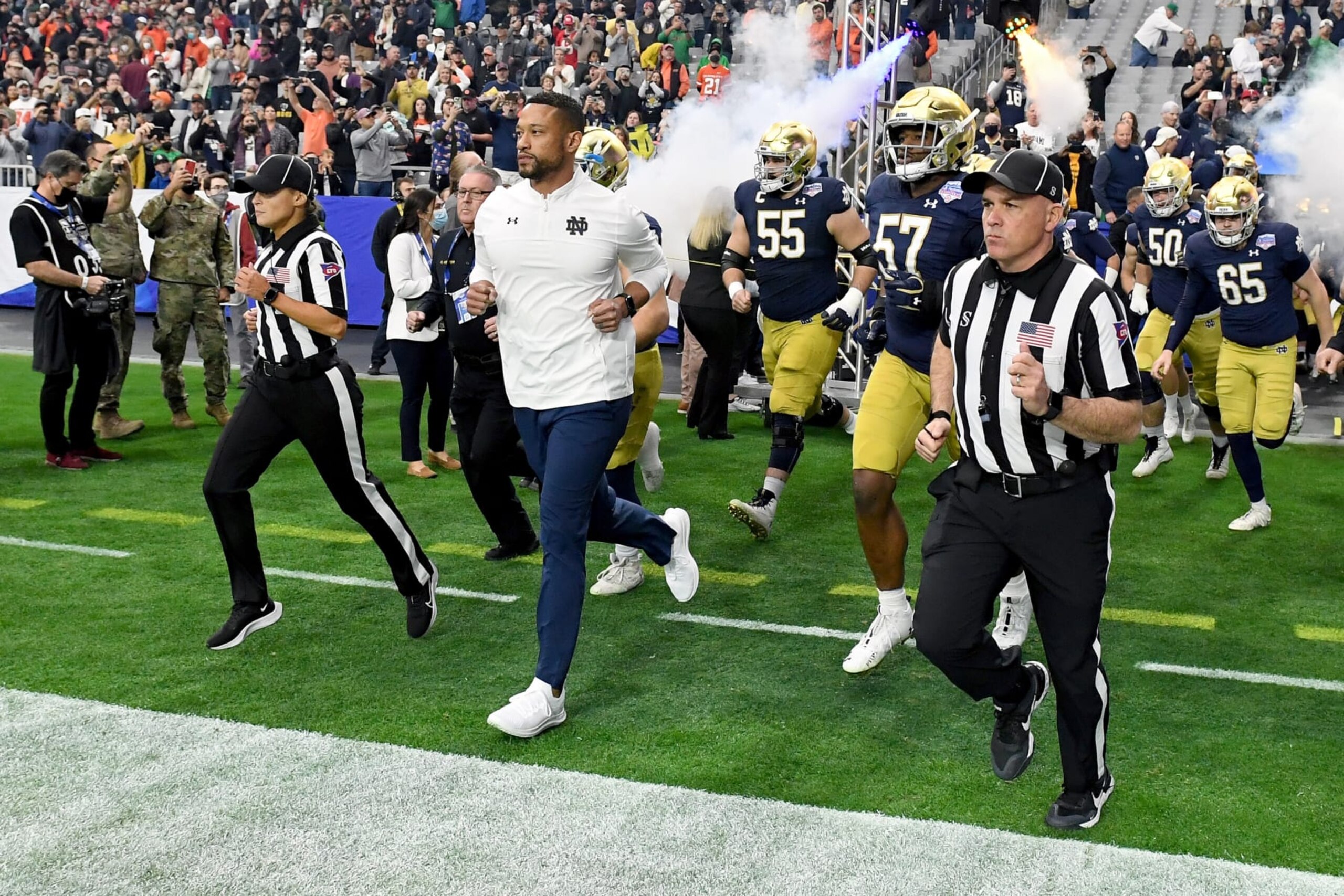 GLENDALE, ARIZONA - JANUARY 01: Head coach Marcus Freeman of the Notre Dame Fighting Irish takes the field before the PlayStation Fiesta Bowl against the Oklahoma State Cowboys at State Farm Stadium on January 01, 2022 in Glendale, Arizona. (Photo by Norm Hall/Getty Images)