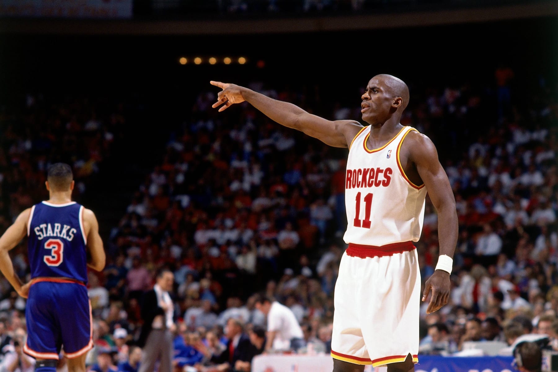 HOUSTON - JUNE 22:  Vernon Maxwell #11 of the Houston Rockets points during Game Seven of the 1994 NBA Finals at the Summit on June 22, 1994 in Houston, Texas.  NOTE TO USER: User expressly acknowledges that, by downloading and or using this photograph, User is consenting to the terms and conditions of the Getty Images License agreement. Mandatory Copyright Notice: Copyright 1994 NBAE (Photo by Andrew D. Bernstein/NBAE via Getty Images)