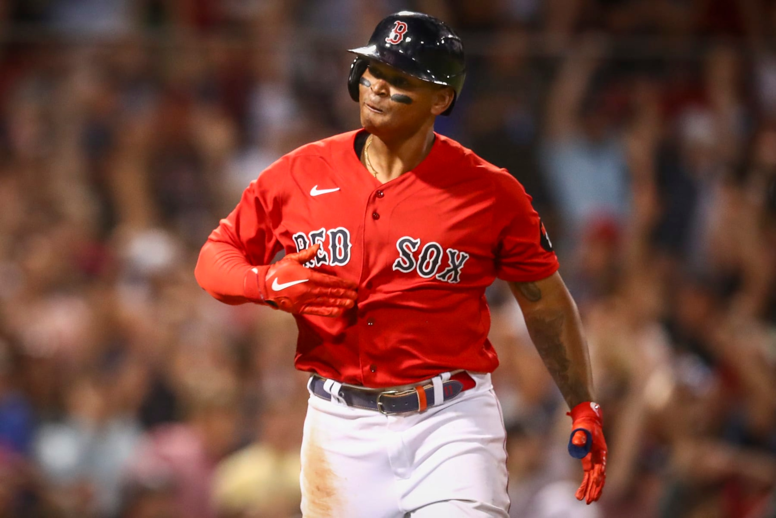 BOSTON, MA - JULY 07: Rafael Devers #11 of the Boston Red Sox reacts as he tosses his bat after hitting a three-run home run in the fifth inning of a game against the New York Yankees at Fenway Park on July 7, 2022 in Boston, Massachusetts. (Photo by Adam Glanzman/Getty Images) BOSTON, MA - JULY 07: Rafael Devers #11 of the Boston Red Sox reacts as he tosses his bat after hitting a three-run home run in the fifth inning of a game against the New York Yankees at Fenway Park on July 7, 2022 in Boston, Massachusetts. (Photo by Adam Glanzman/Getty Images)