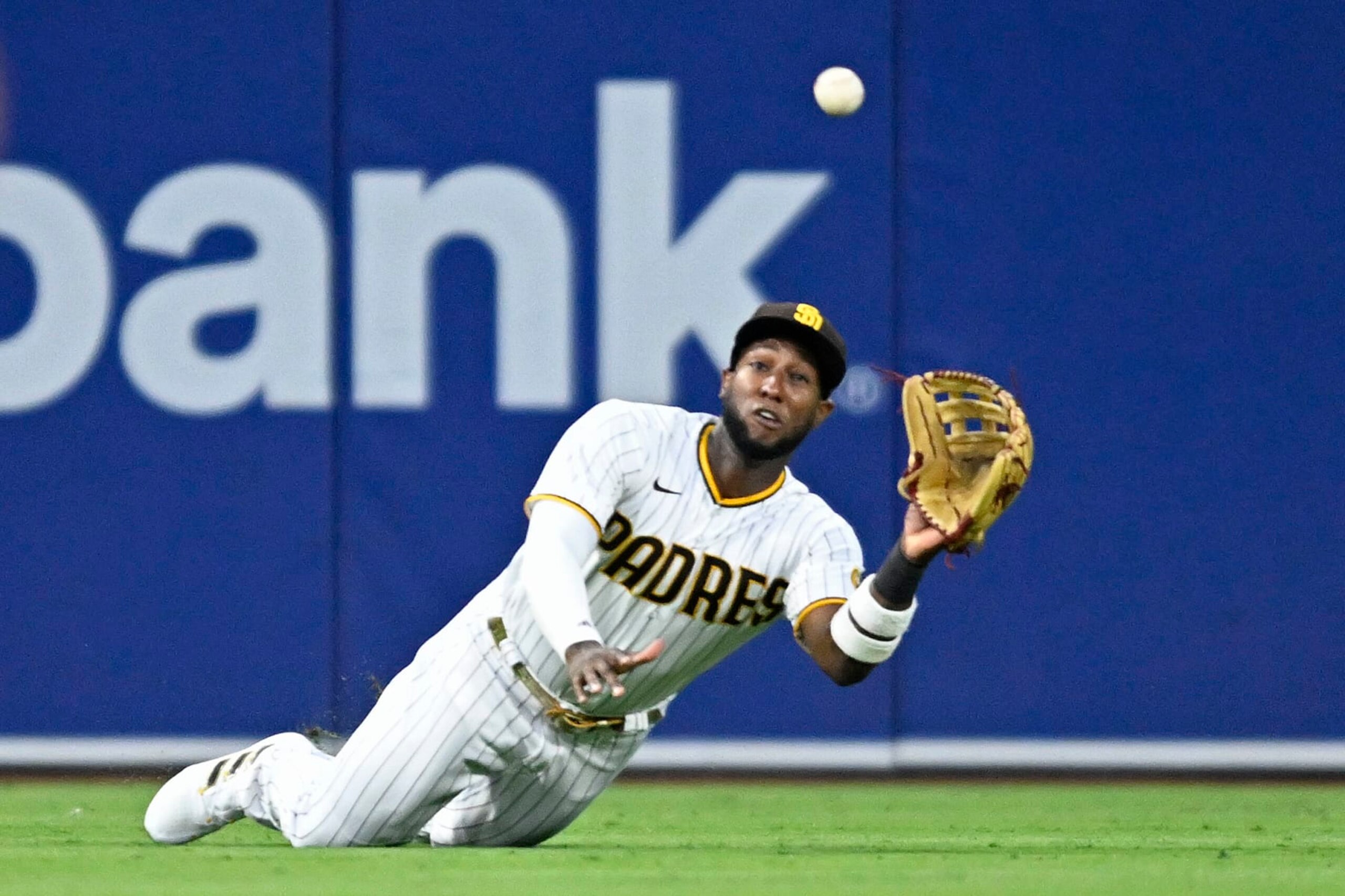 SAN DIEGO, CA - AUGUST 1: Jurickson Profar #10 of the San Diego Padres makes a diving catch on a ball off the bat of Randal Grichuk of the Colorado Rockies during the fourth inning August 1, 2022 at Petco Park in San Diego, California. (Photo by Denis Poroy/Getty Images) SAN DIEGO, CA - AUGUST 1: Jurickson Profar #10 of the San Diego Padres makes a diving catch on a ball off the bat of Randal Grichuk of the Colorado Rockies during the fourth inning August 1, 2022 at Petco Park in San Diego, California. (Photo by Denis Poroy/Getty Images)